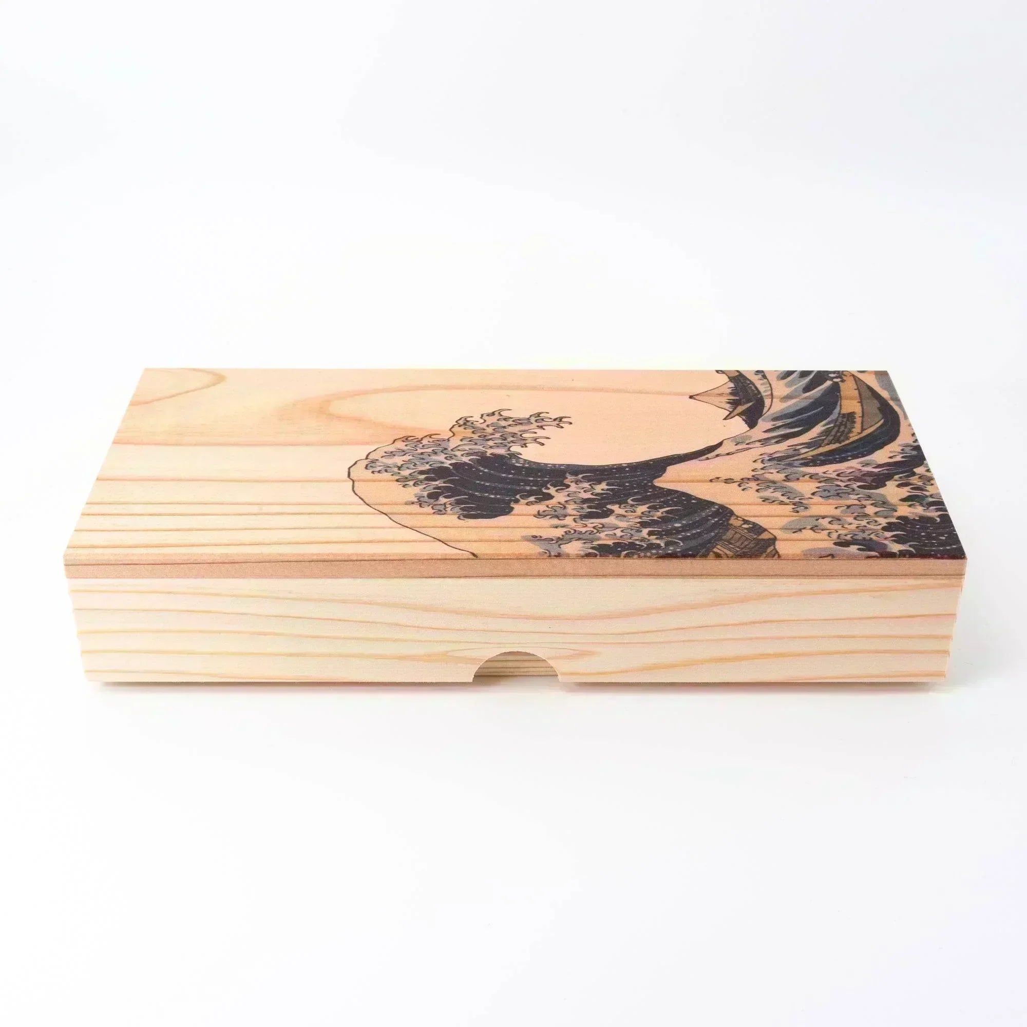 Rectangular wooden box with a laser-engraved Hokusai Great Wave design on the lid, blending traditional art with natural wood grain.