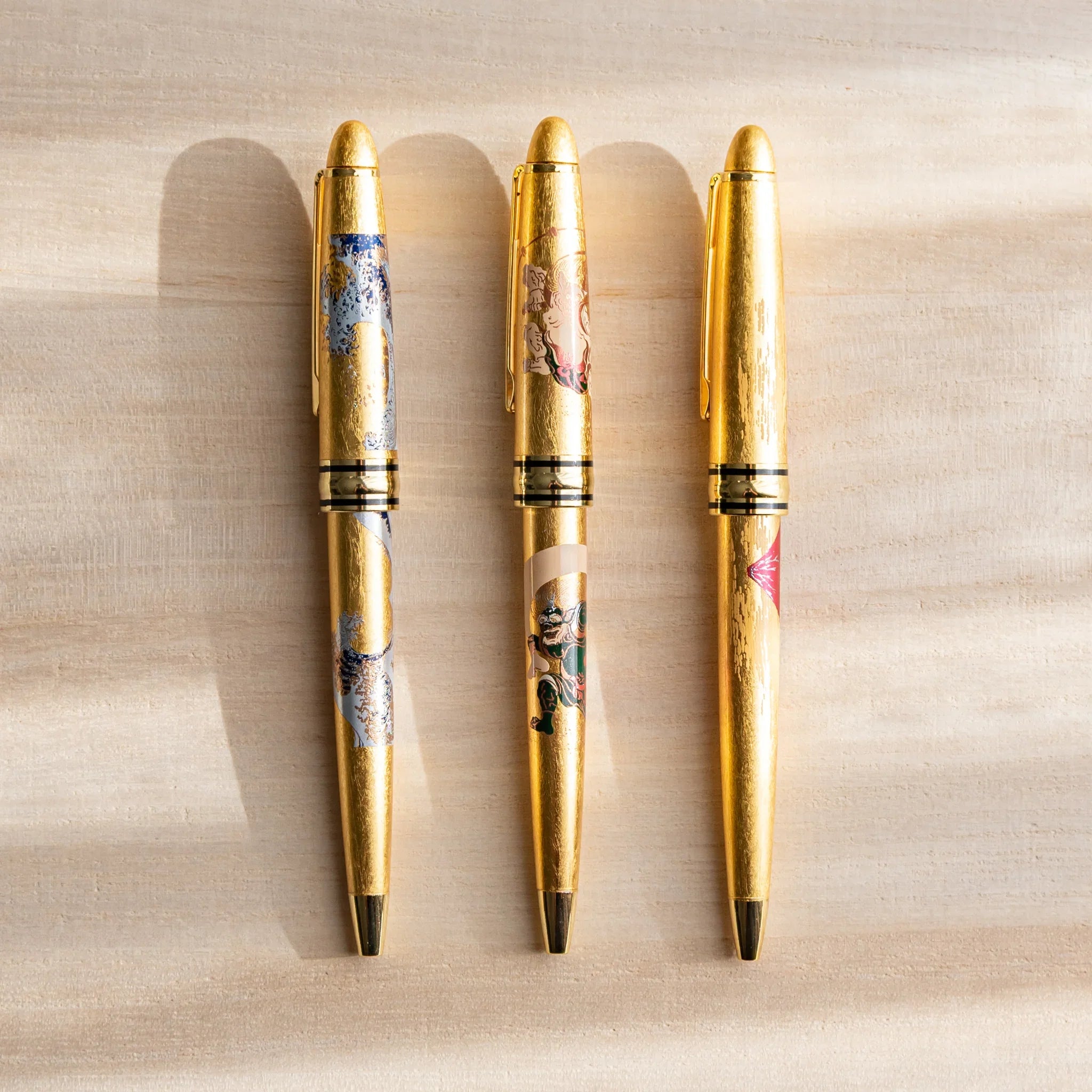 Gold Leaf Great Wave retractable pen showing traditional Hokusai artwork design displayed clearly composition