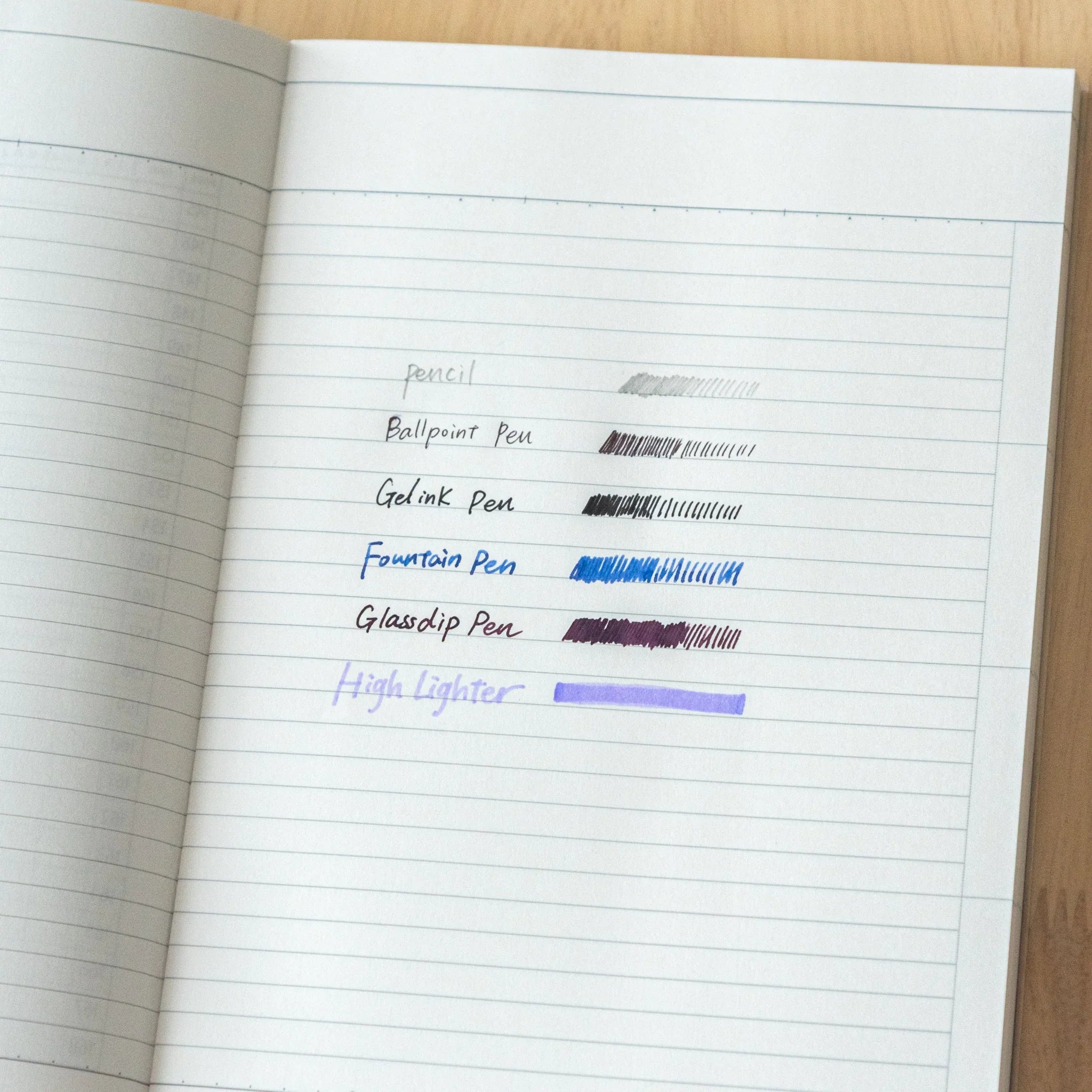 Logical Search Notebook pages fanned open to reveal cream-colored paper quality and page texture finish