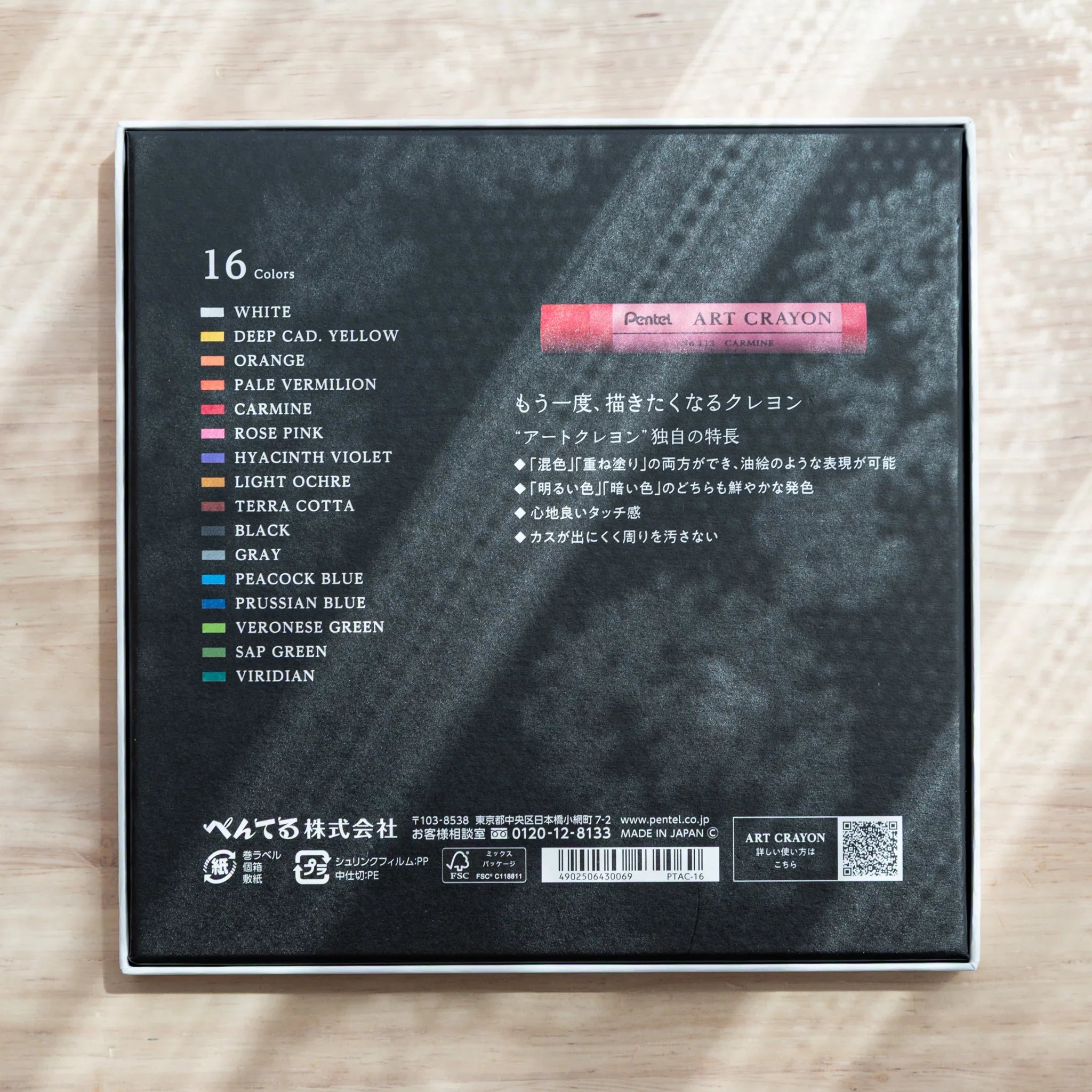 Back of Japanese crayon set by Pentel showing color chart of 16 colors with names and swatches and product information on box