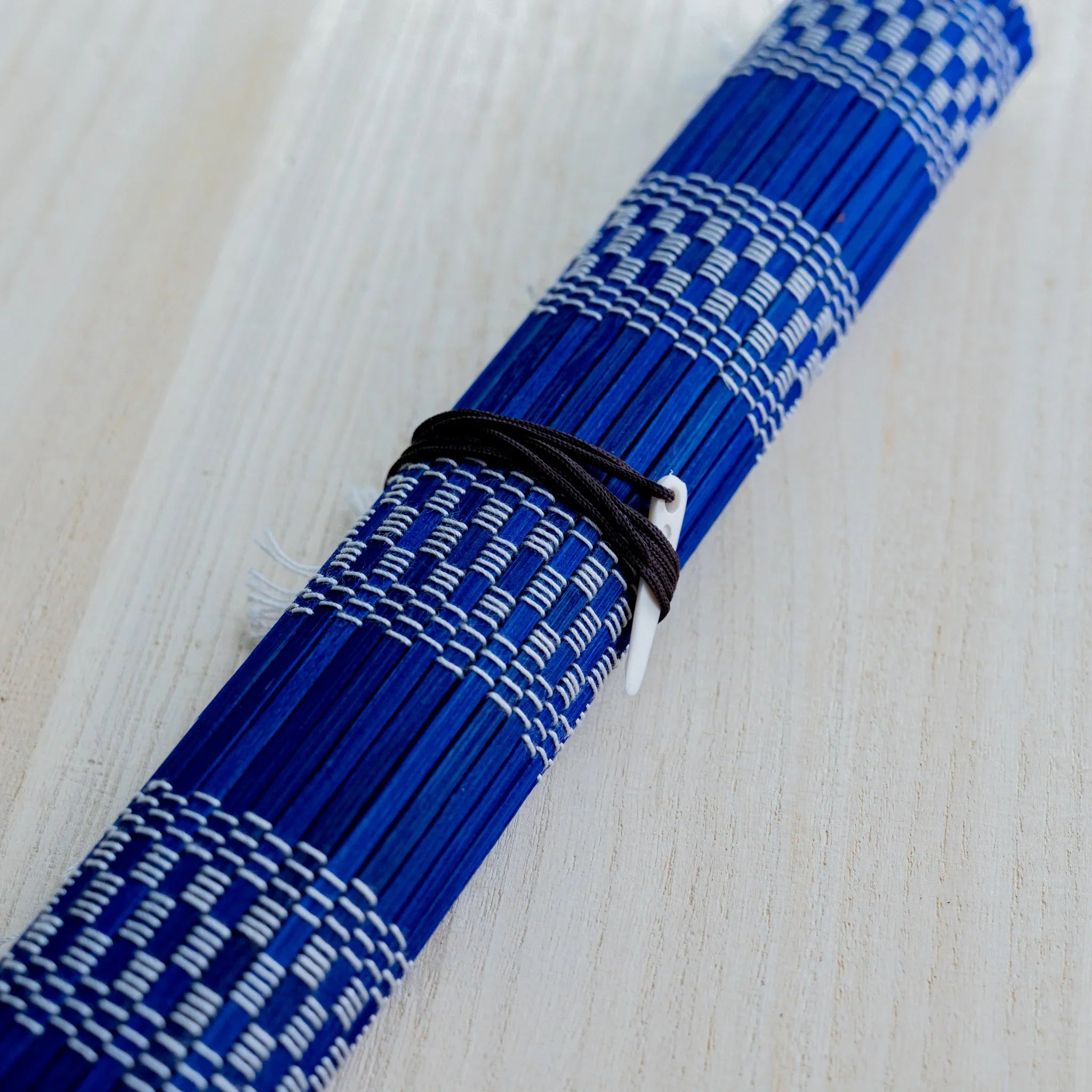 Akashiya bamboo brush roll, blue, with cotton tie cord and toggle clasp