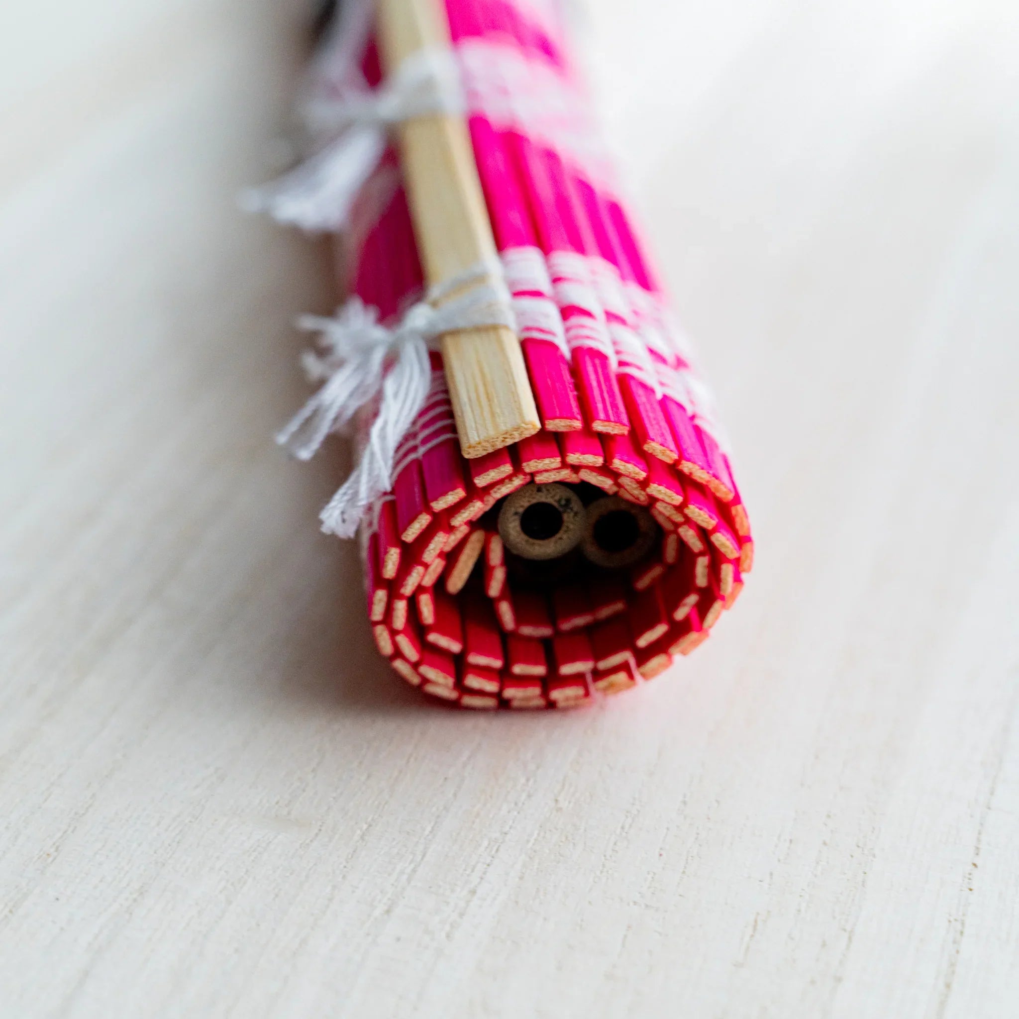 Akashiya bamboo brush wrap, red, flat-laid full view of the mat