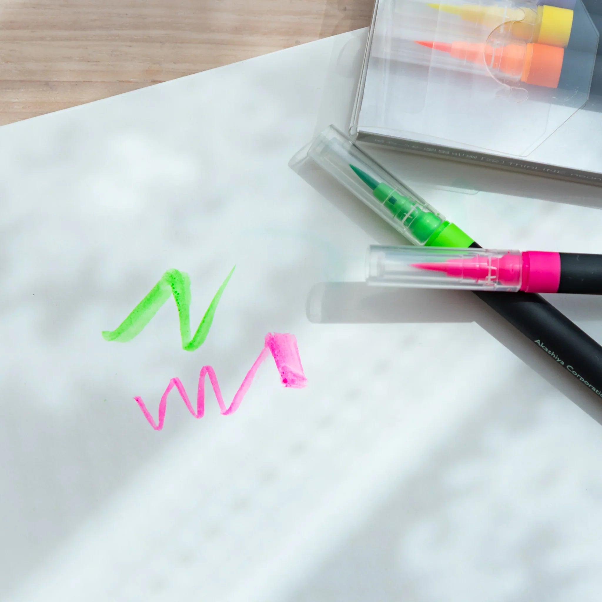 Individual thin-line brush pen showing fine tip designed for detailed neon color watercolor artwork creation