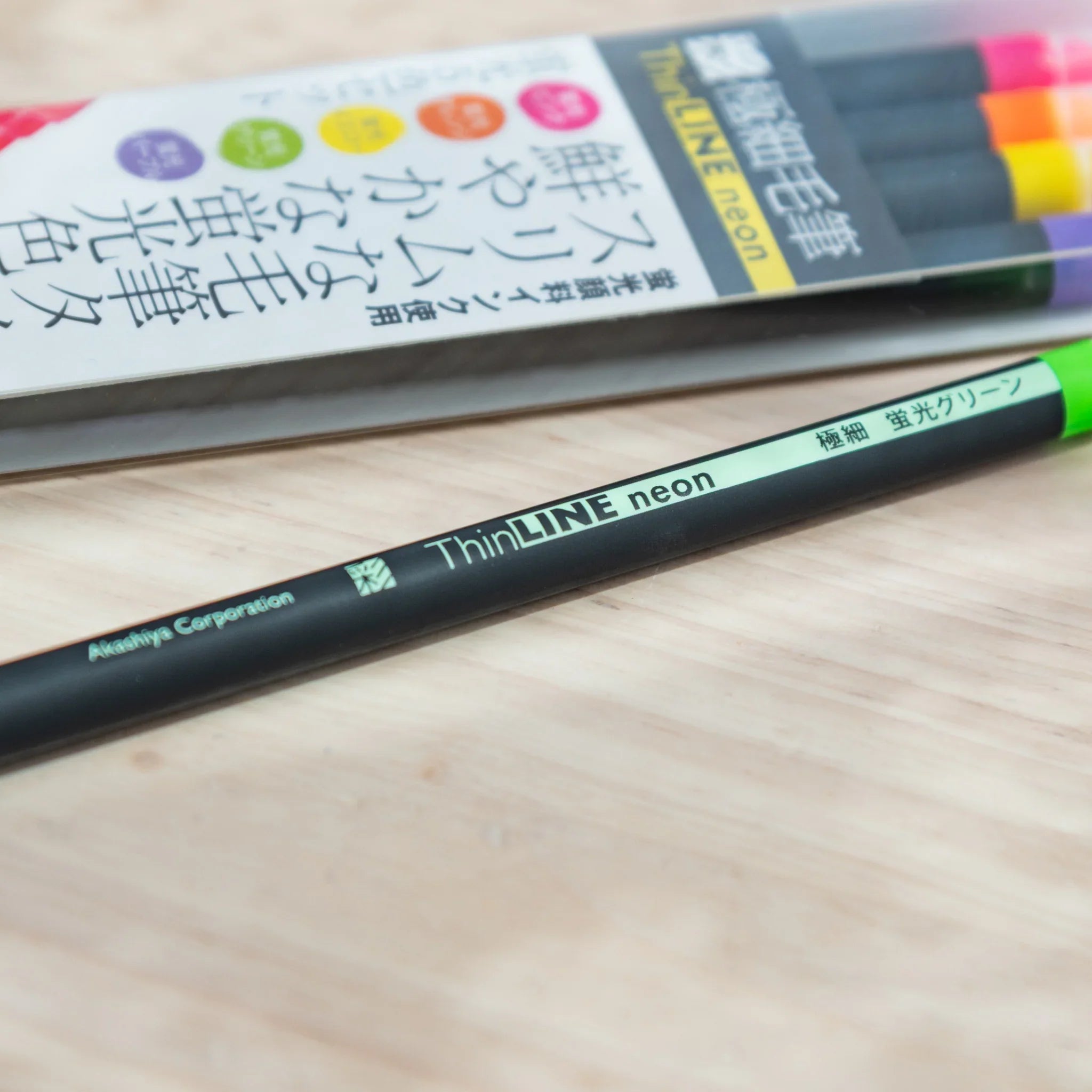 Vibrant colored brush pens held together showing fluorescent tones and practical size for detailed drawing