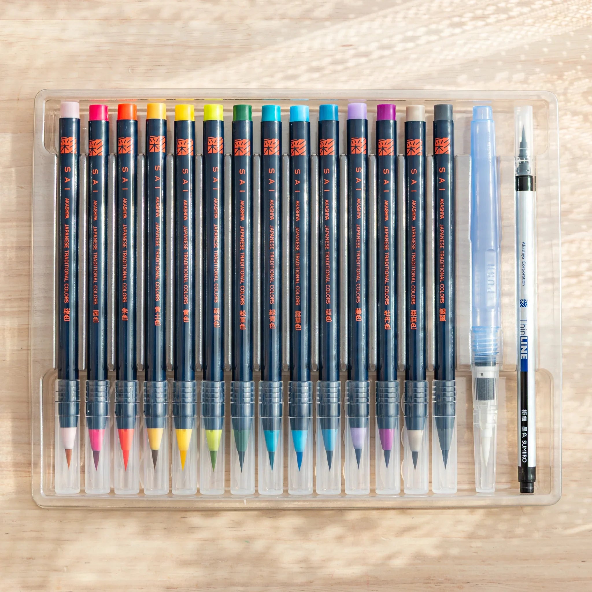 Akashiya Sai Watercolor Brush Pens - Japanese Traditional Colors: Modern Calligraphy (15 Colors), angled view showing all sid