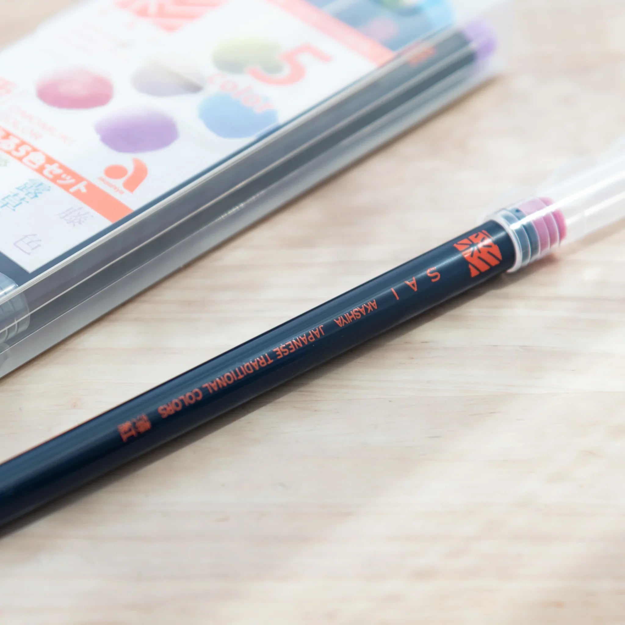 Five subtle colored brush pens showing soft muted pigments ideal for understated artistic painting work