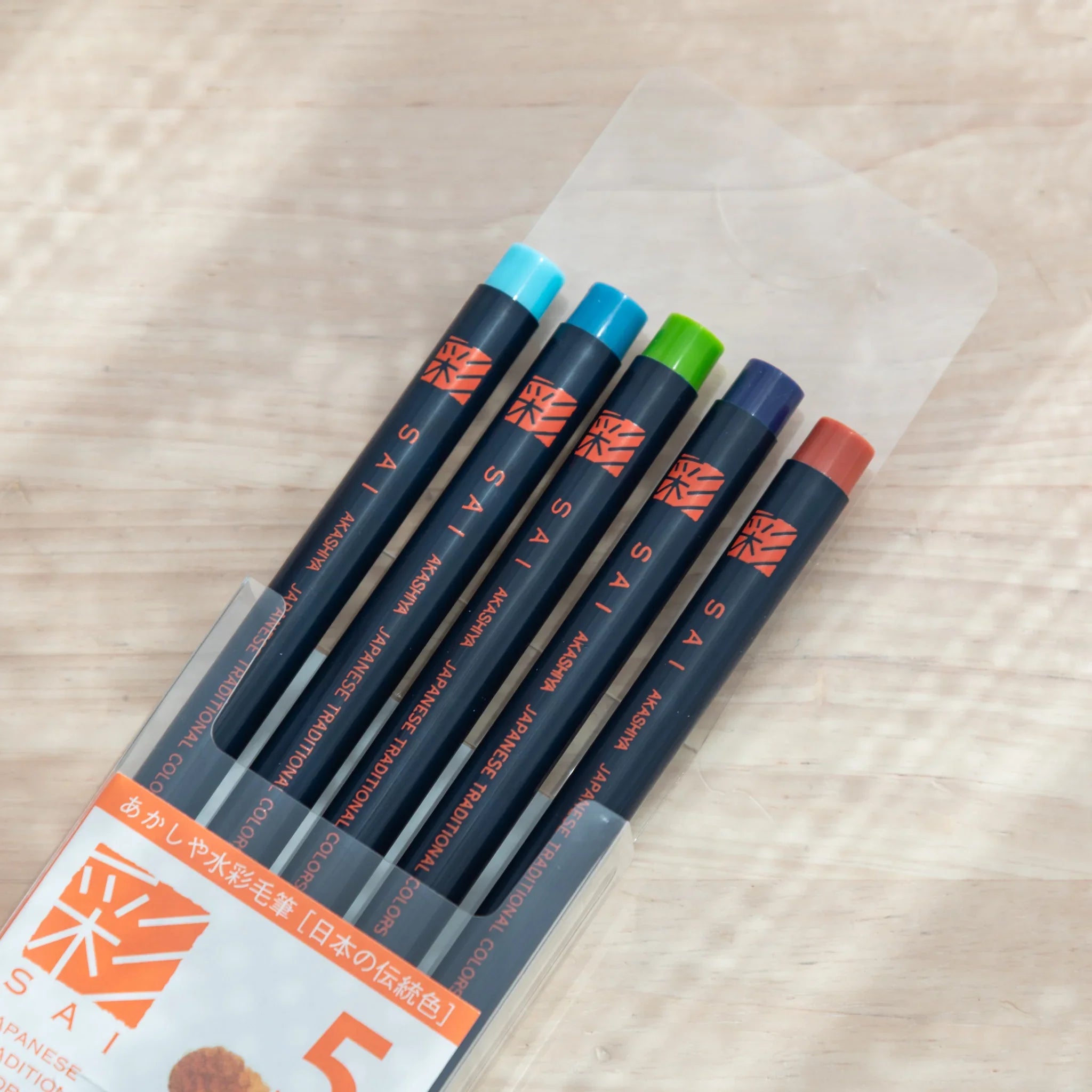 Individual summer color brush pen with flexible bristle tip designed for bright vibrant watercolor art