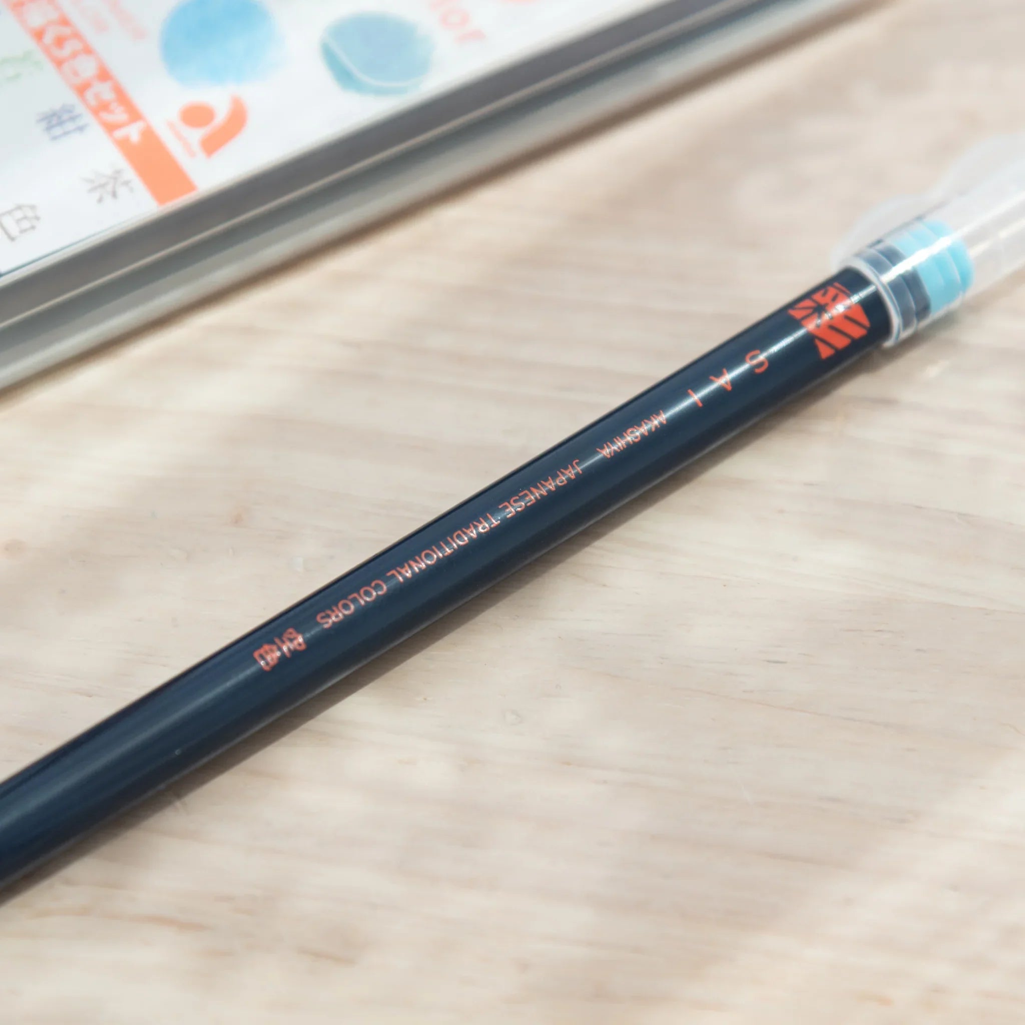 Packaging box for Akashiya Sai summer color brush pen set featuring bright tropical color swatch palette