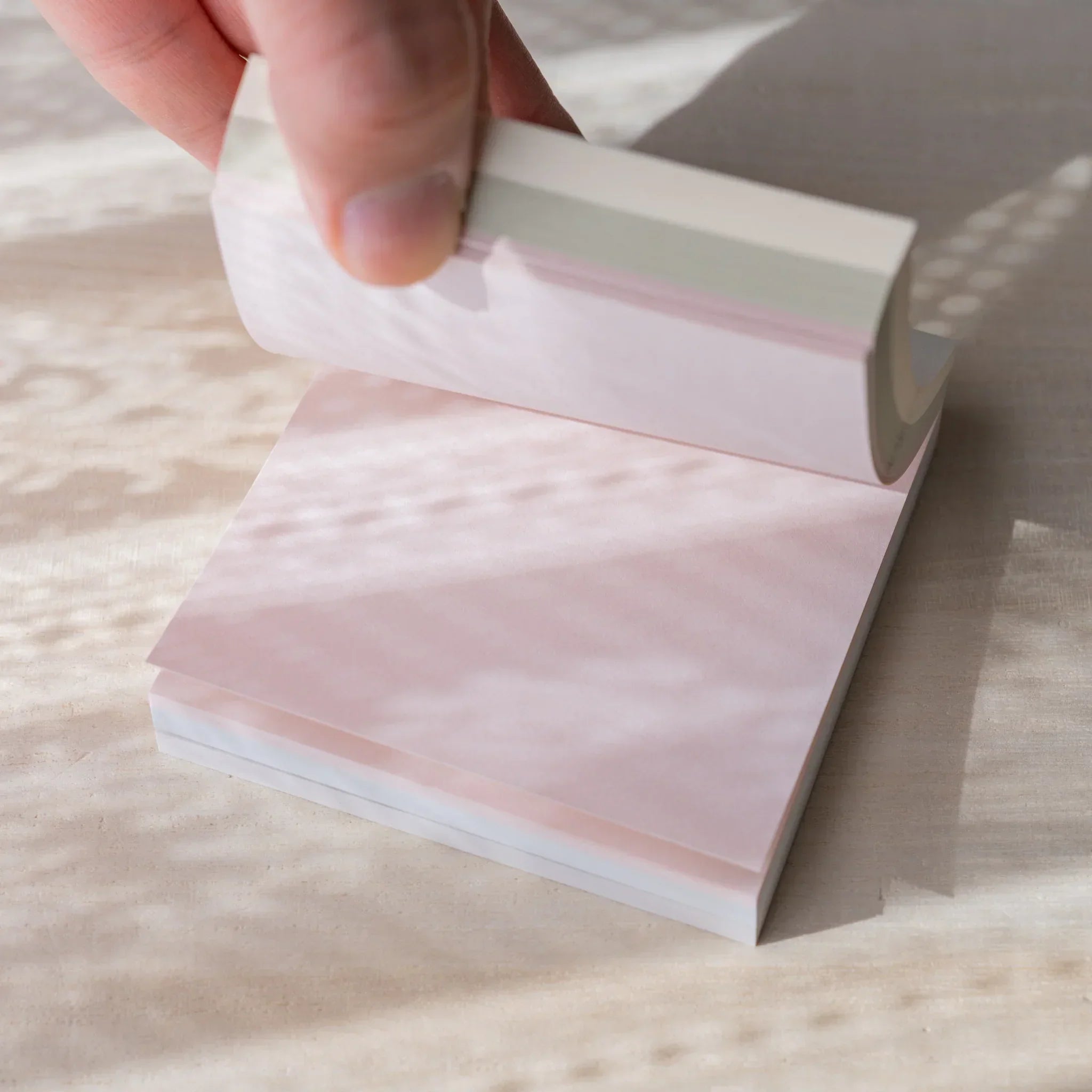 Detailed close-up of quality memo pad pages showing fine ruled horizontal lines for clear neat writing