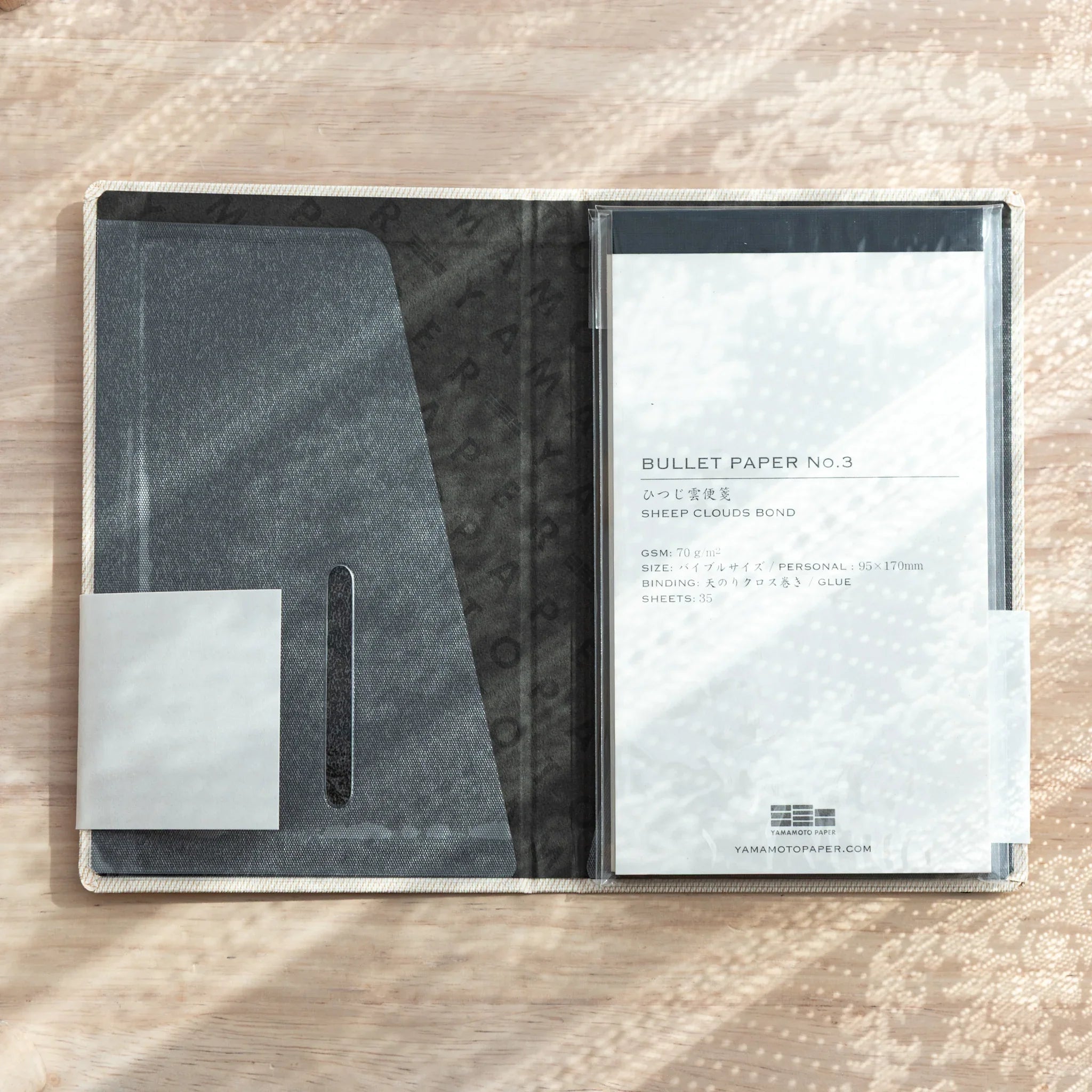 Bullet Jotter ivory white cover open, left lining and card slot, right clear pocket with BULLET PAPER No.3 Sheep Clouds Bond