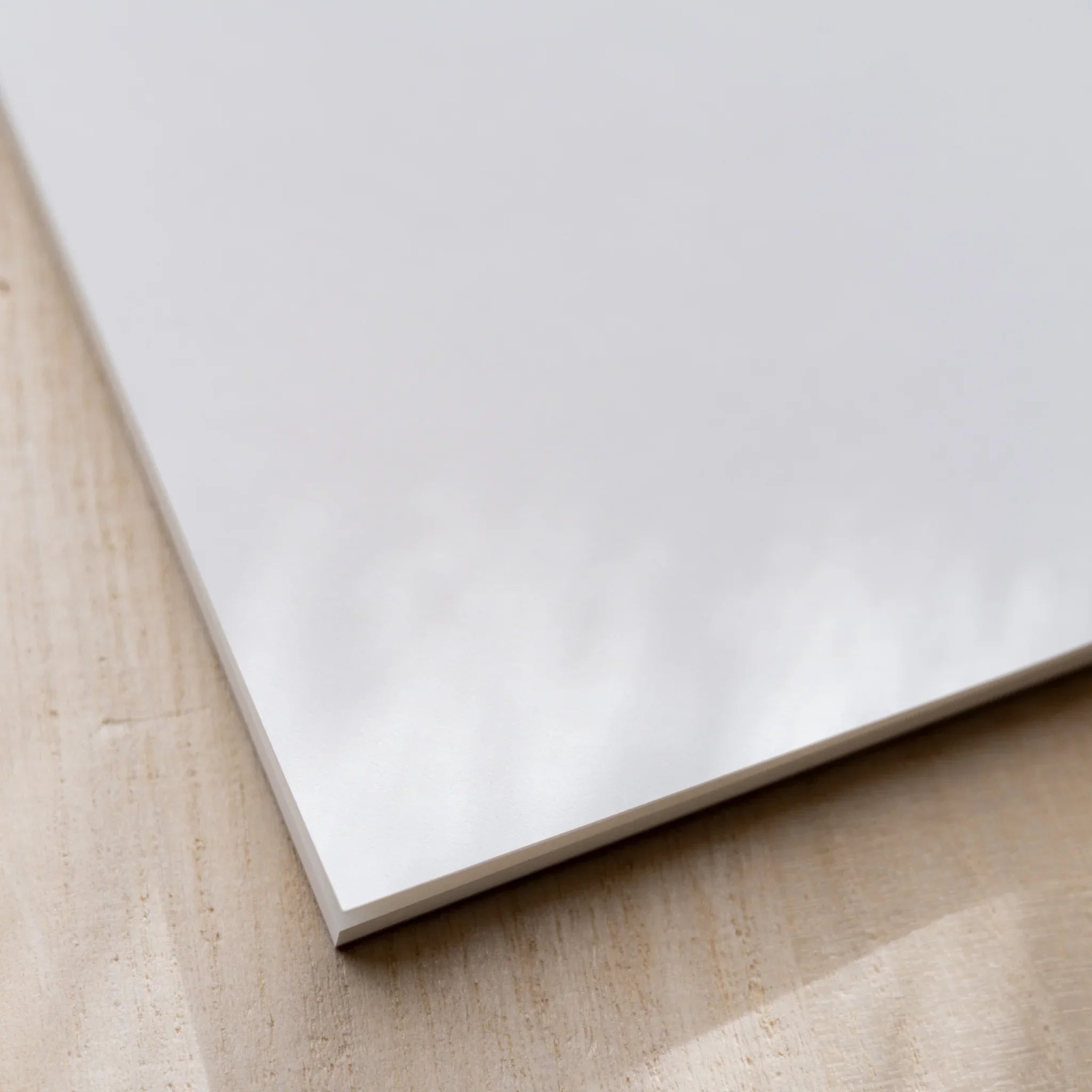 Corner close-up of Yamamoto Paper Sanzen Tomoe River S Bullet Paper No.1 fountain pen friendly notepad.
