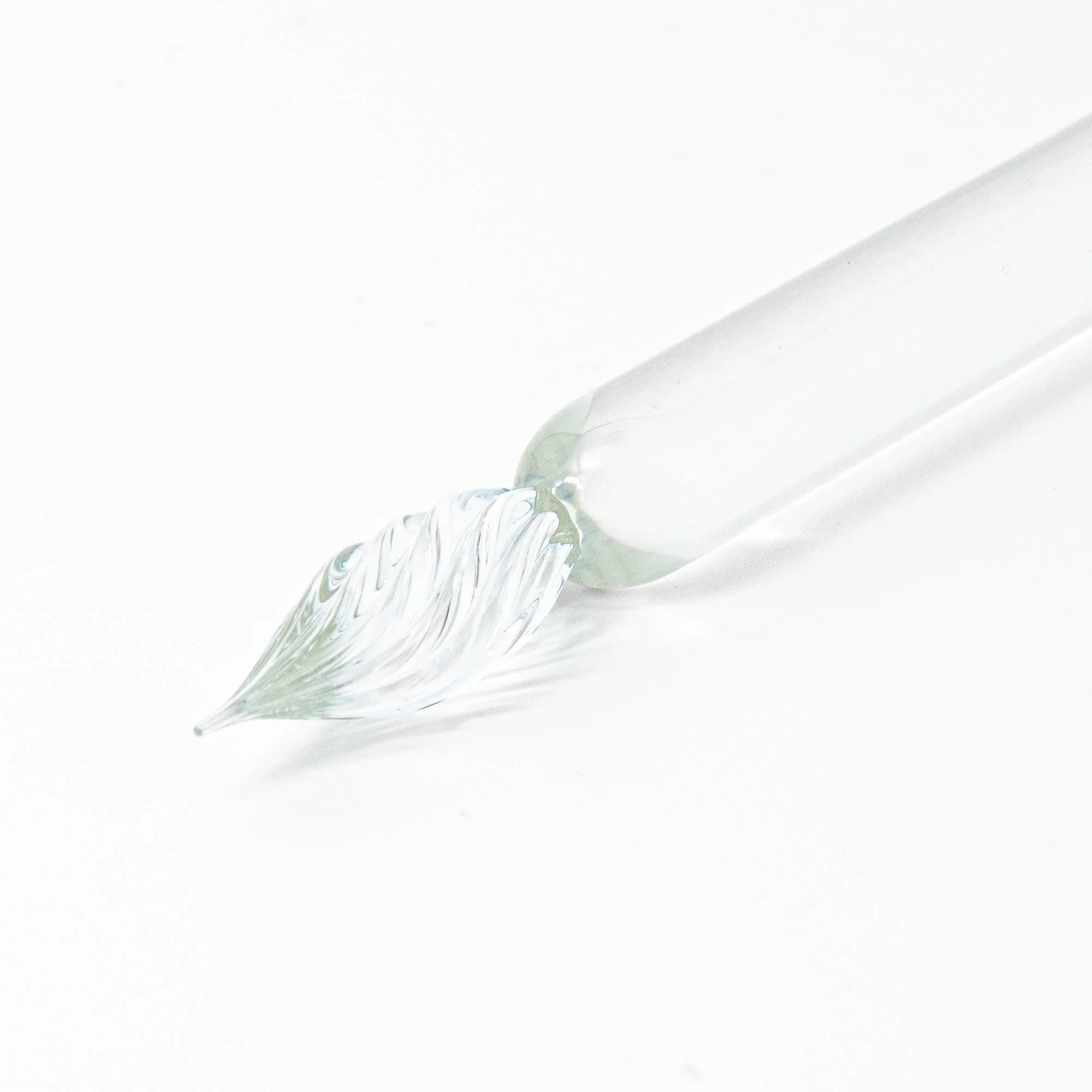 Cat-shaped glass dip pen featuring twisted glass nib and clear glass with feline silhouette design with holder