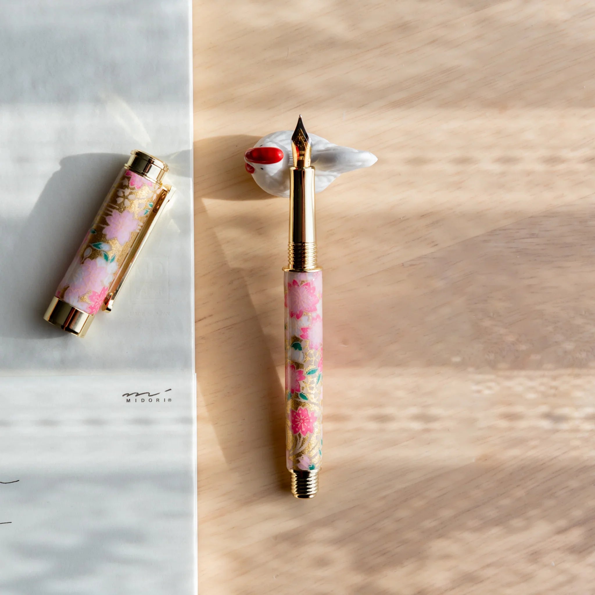 Chabo rooster ceramic pen rest handcrafted Japanese with detailed coloring and decorative rooster design close shot