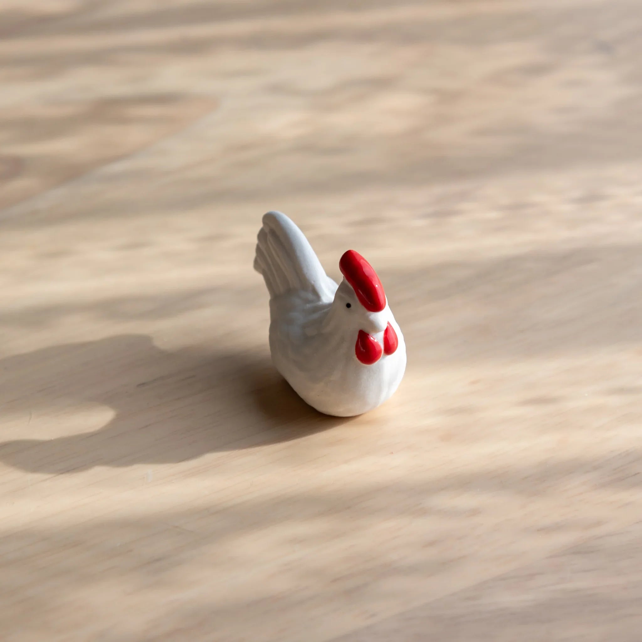 Chabo rooster handcrafted ceramic pen rest Japanese with traditional rooster form and surface detail