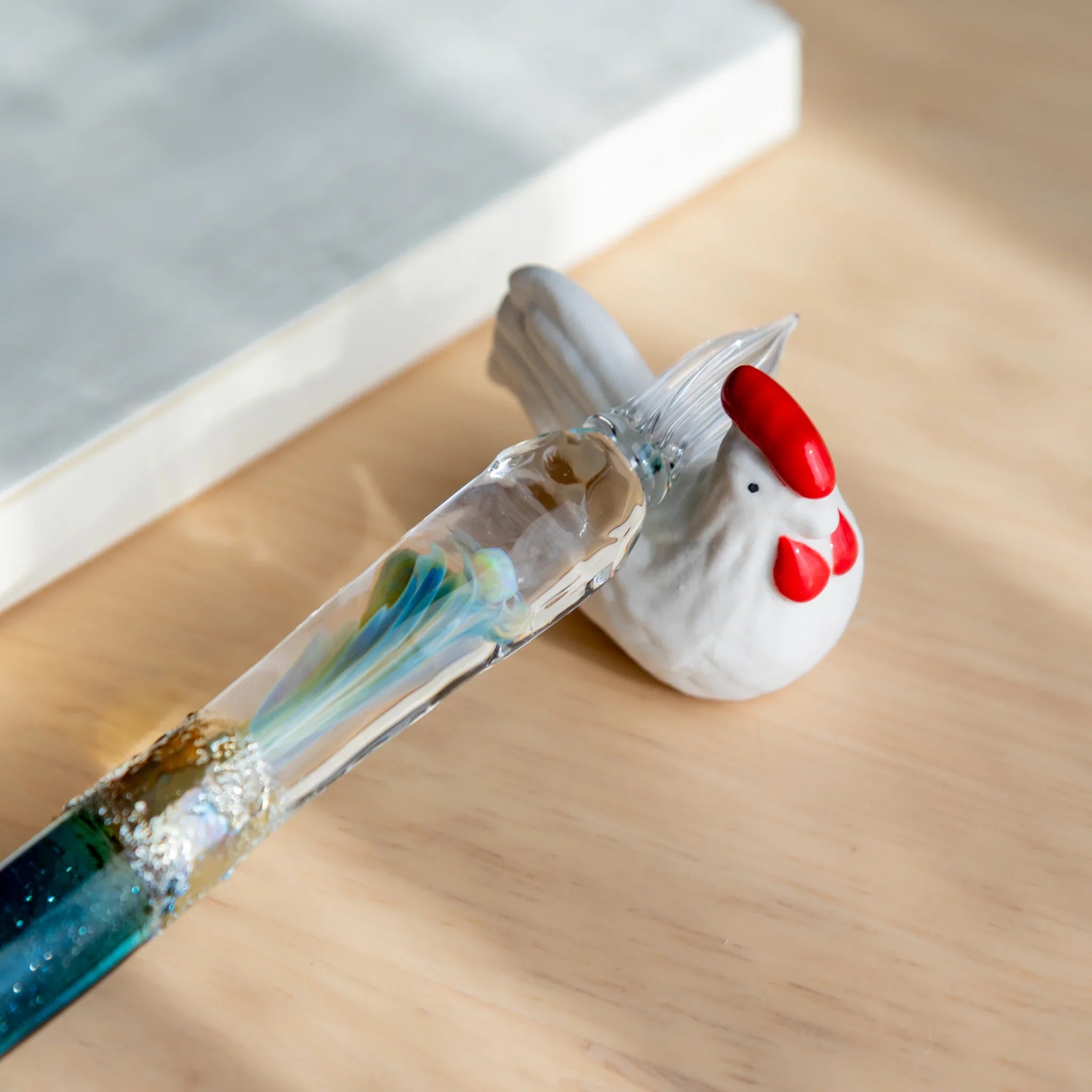 Chabo rooster handcrafted ceramic pen rest Japanese with traditional rooster form and authentic shape close shot