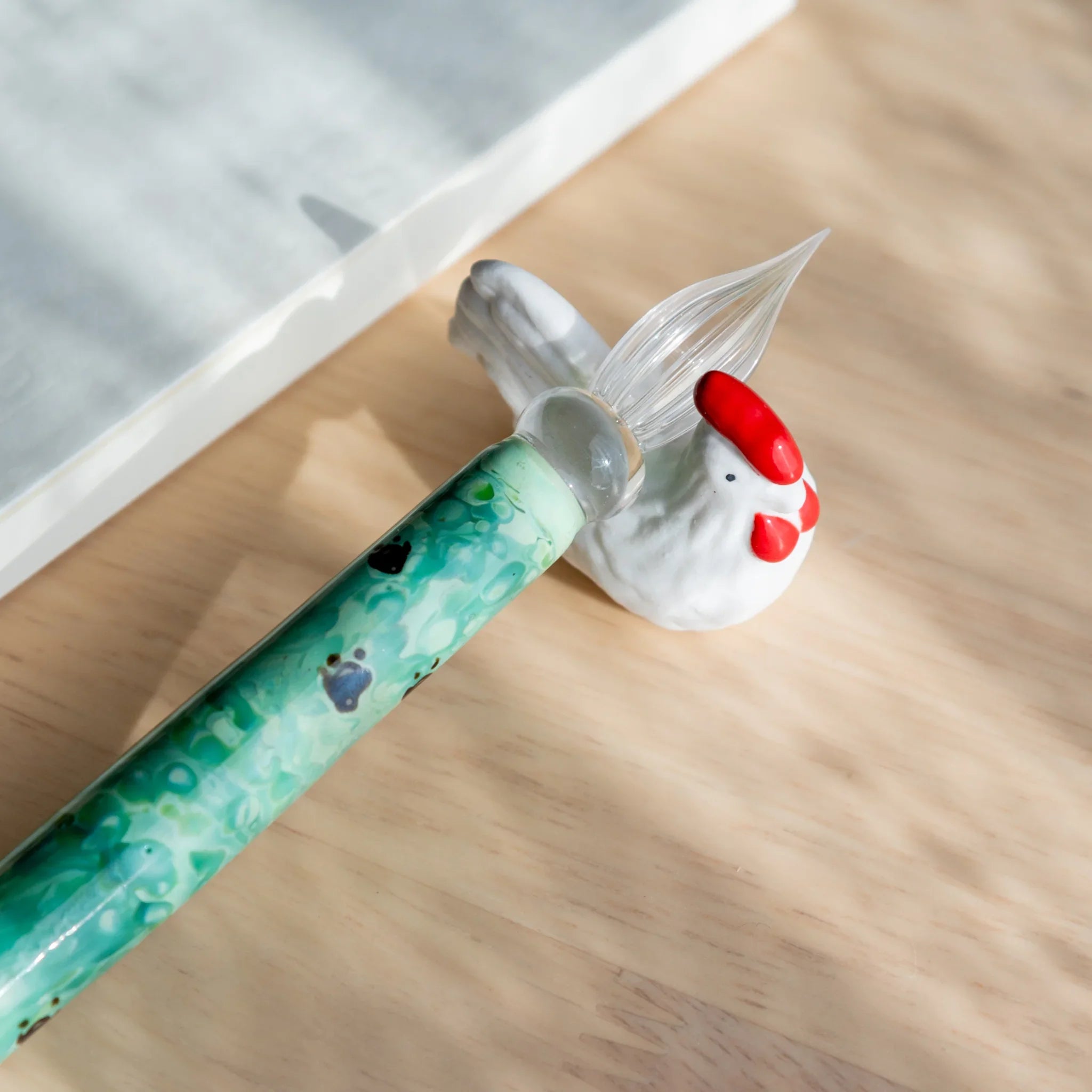 Chabo rooster handcrafted ceramic pen rest Japanese with traditional bird shape close shot