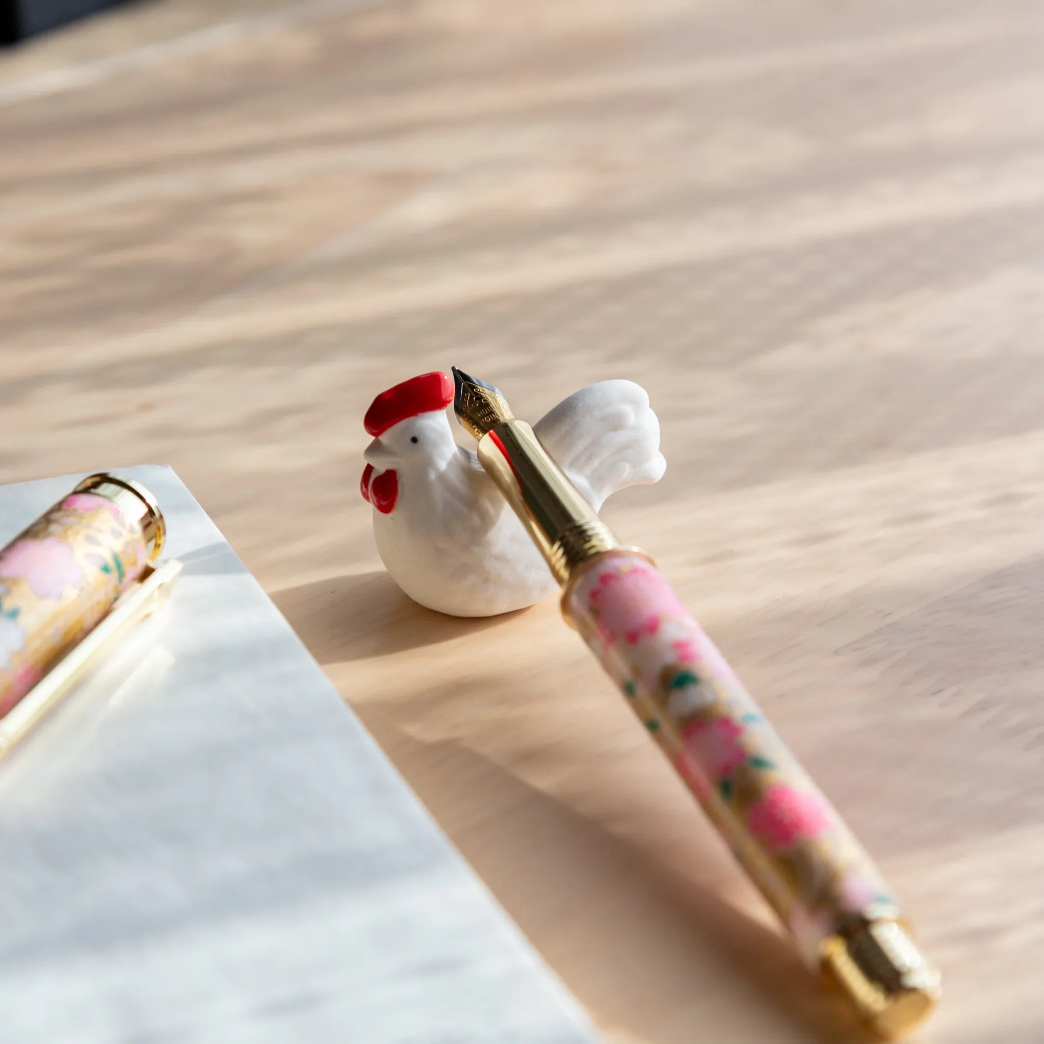 Rooster chabo ceramic pen rest handcrafted Japanese with traditional bird shape close shot