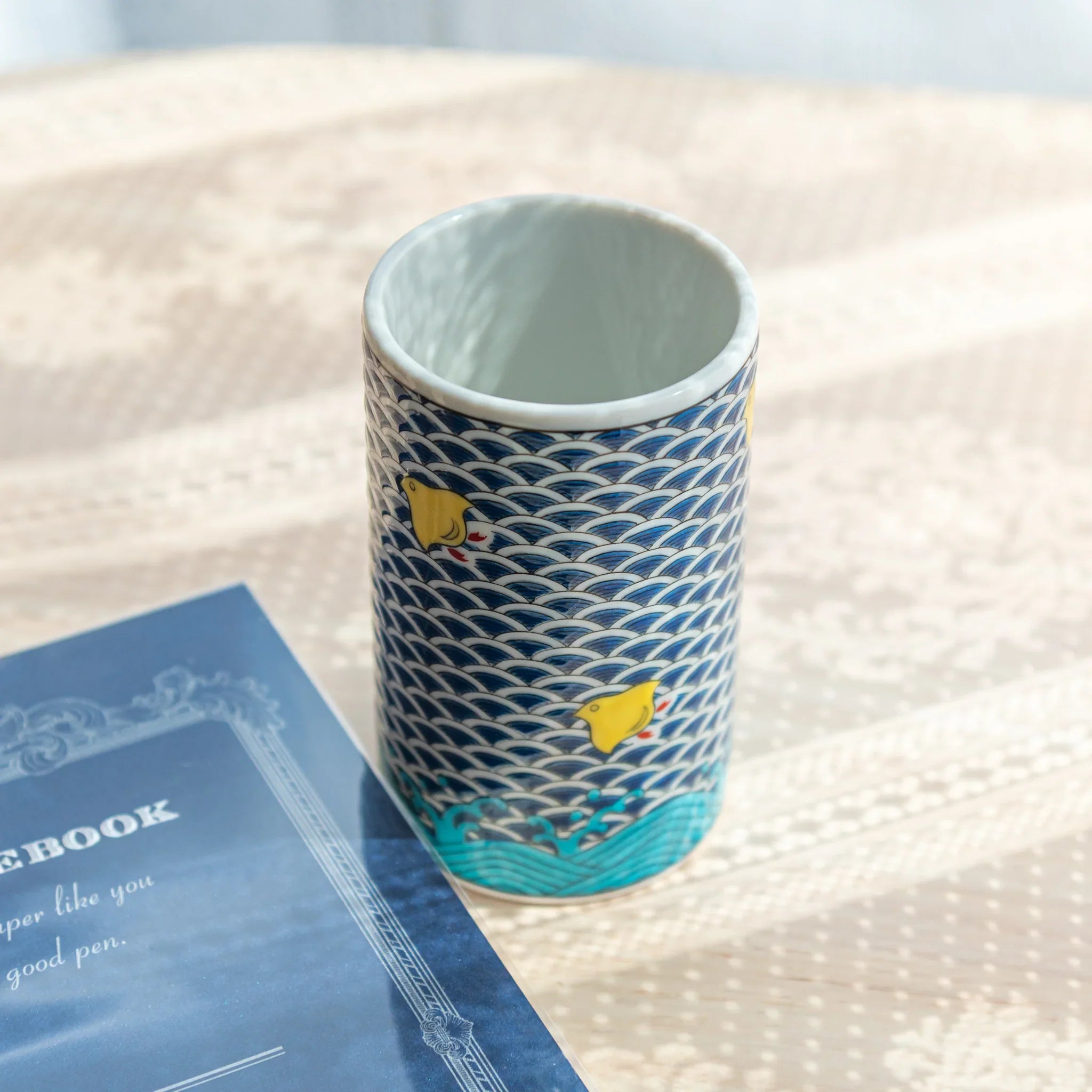 Decorative Kutani ceramic pen holder with vibrant chidori birds and gold accents for desk featuring traditional porcelain