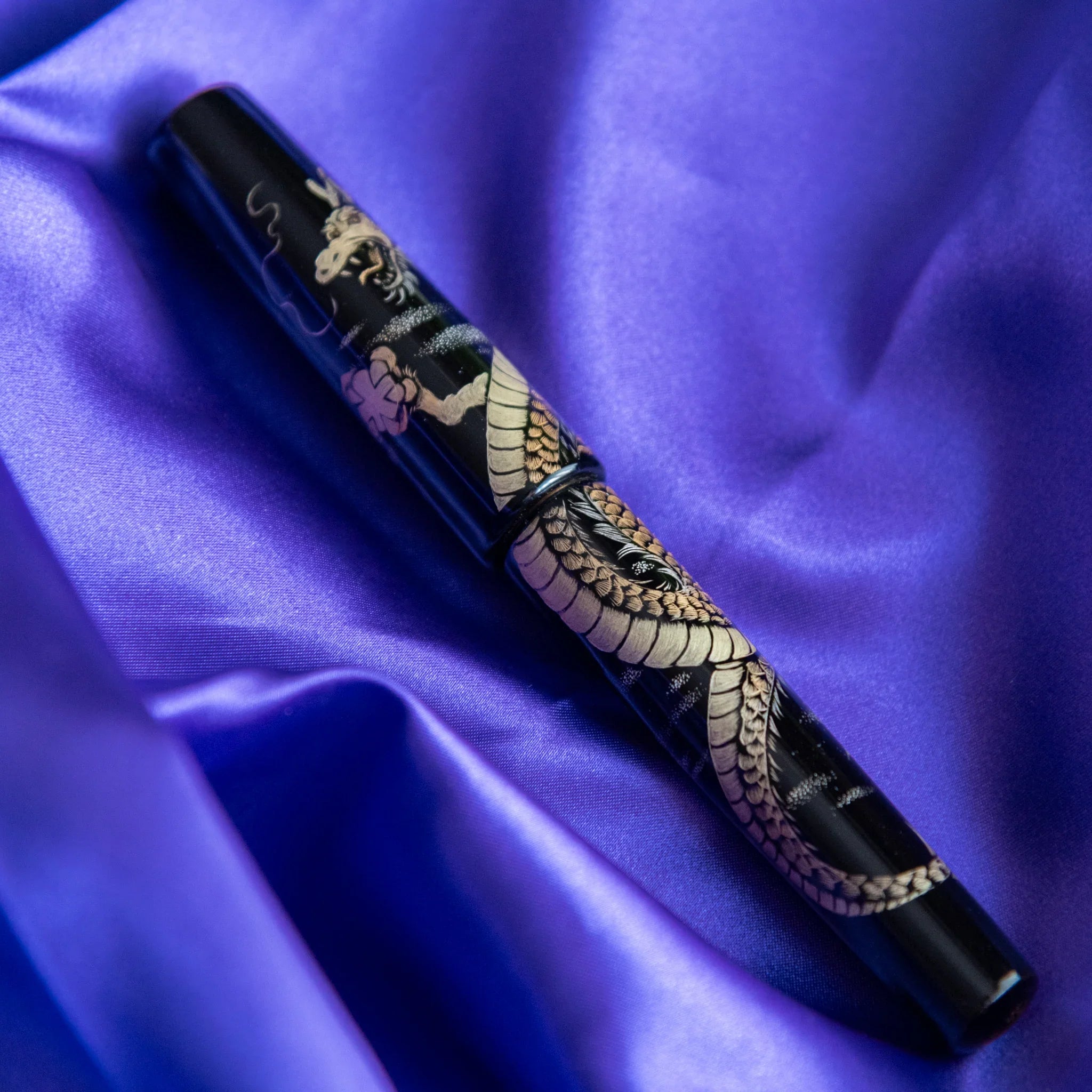 Chinkin Dragon fountain pen nib detail showing 14k gold nib and lacquered barrel showing product quality and design details