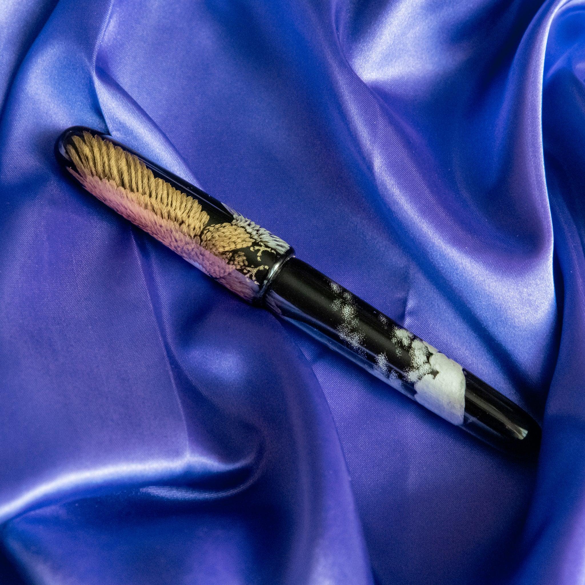 Chinkin Hawk pen displayed at angle showing full profile and lacquer depth showing product quality and design details