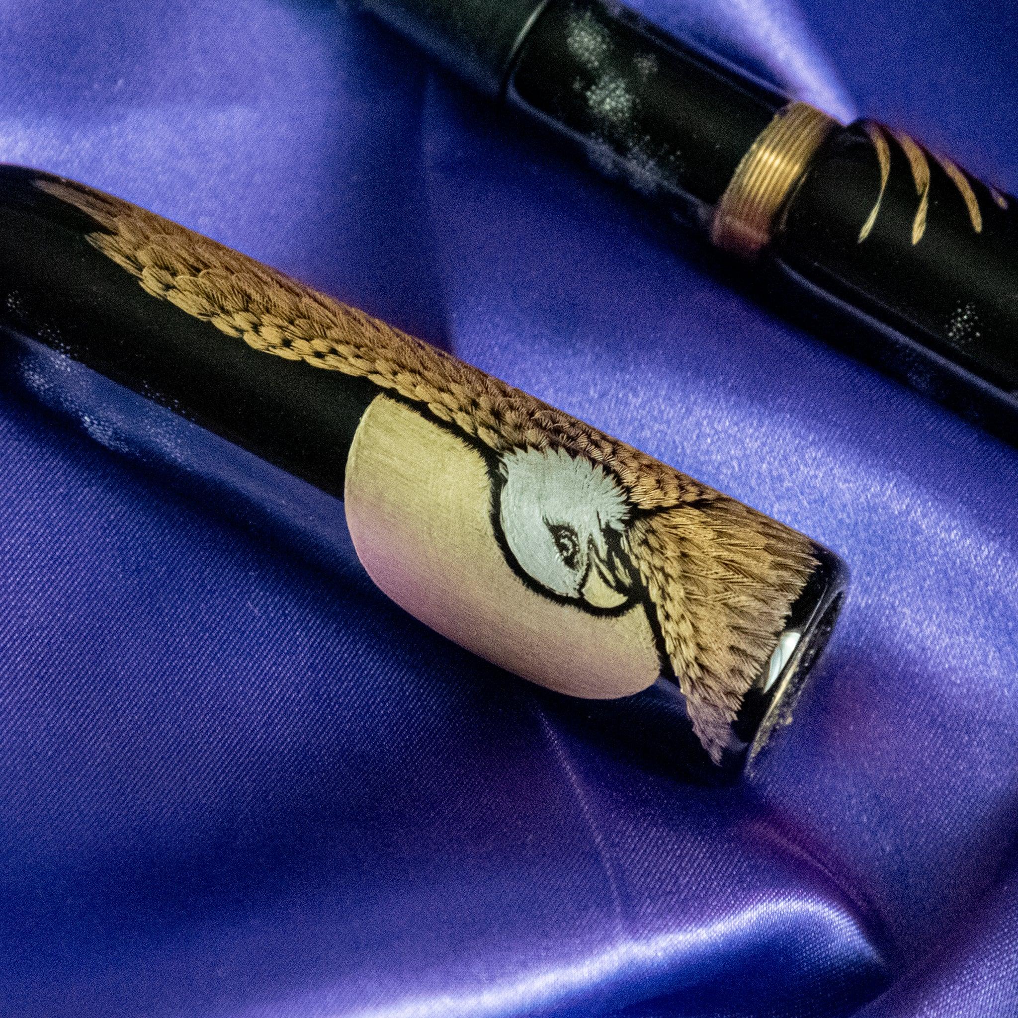 Nib detail of Chinkin Hawk fountain pen showing 14k gold nib and lacquer barrel showing product quality and design details