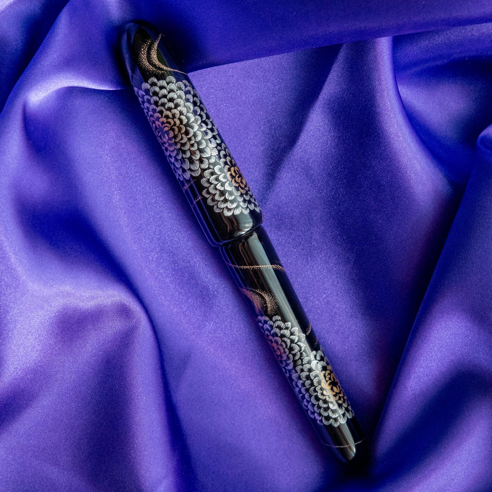 Chinkin Kikusui pen displayed at angle showing full barrel and design orientation showing product quality and design details