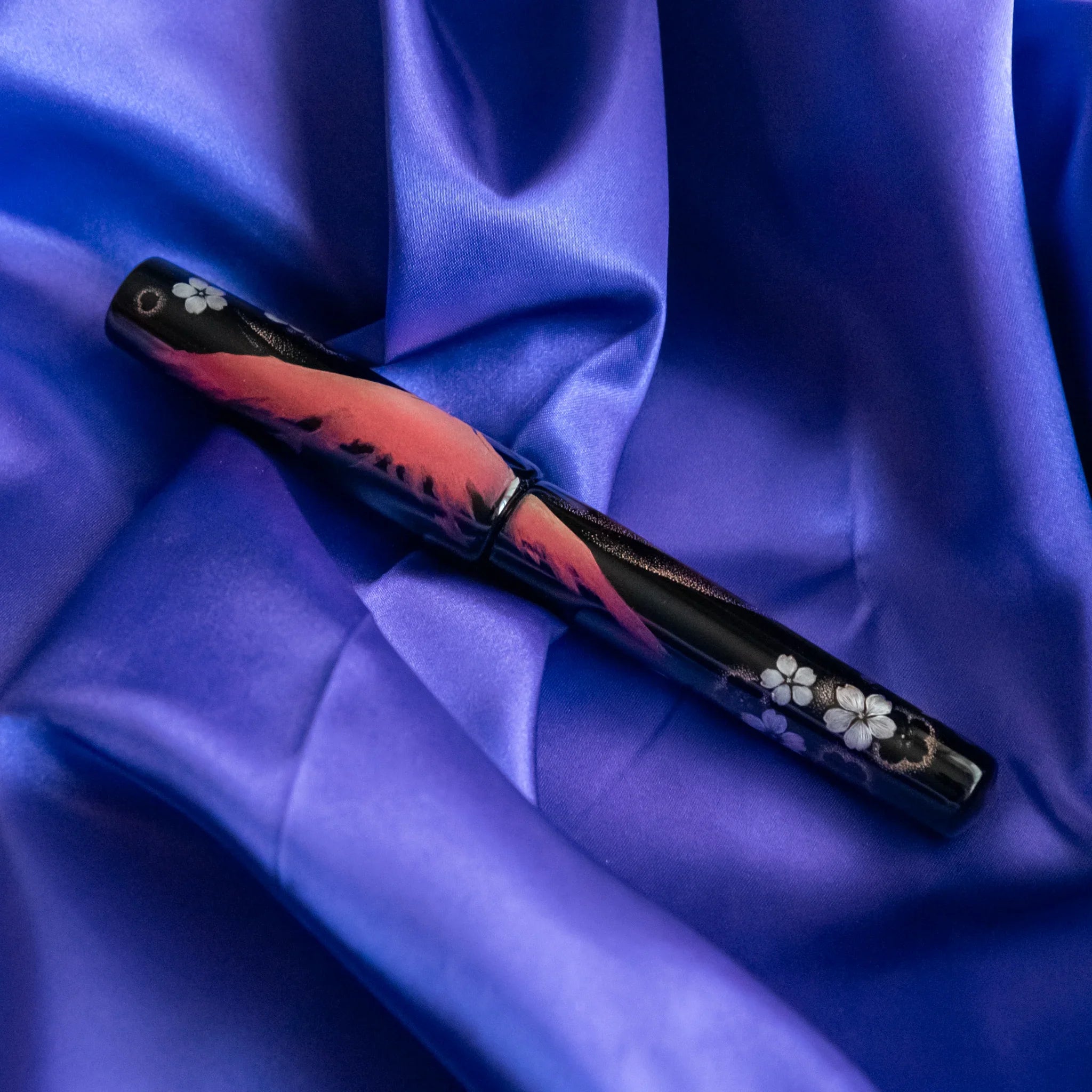 Close-up of sakura and Fuji mountain chinkin design showing detailed metalwork showing product quality and design details