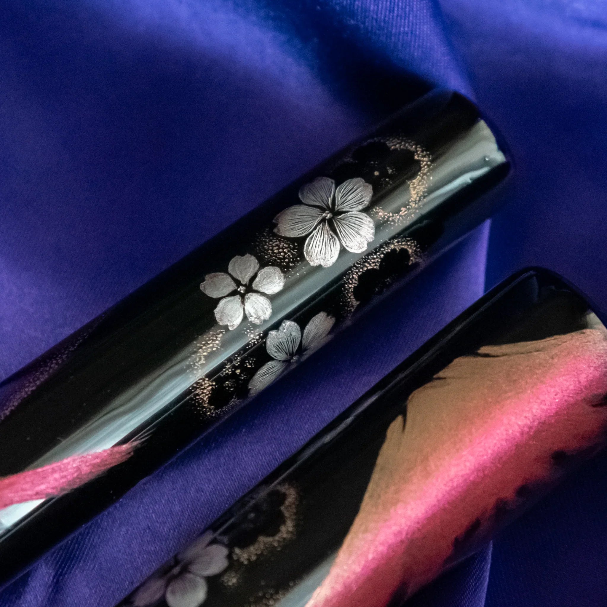 Fountain pen with silk cord tassel showing traditional Japanese mountain and flower theme showing product quality and desi