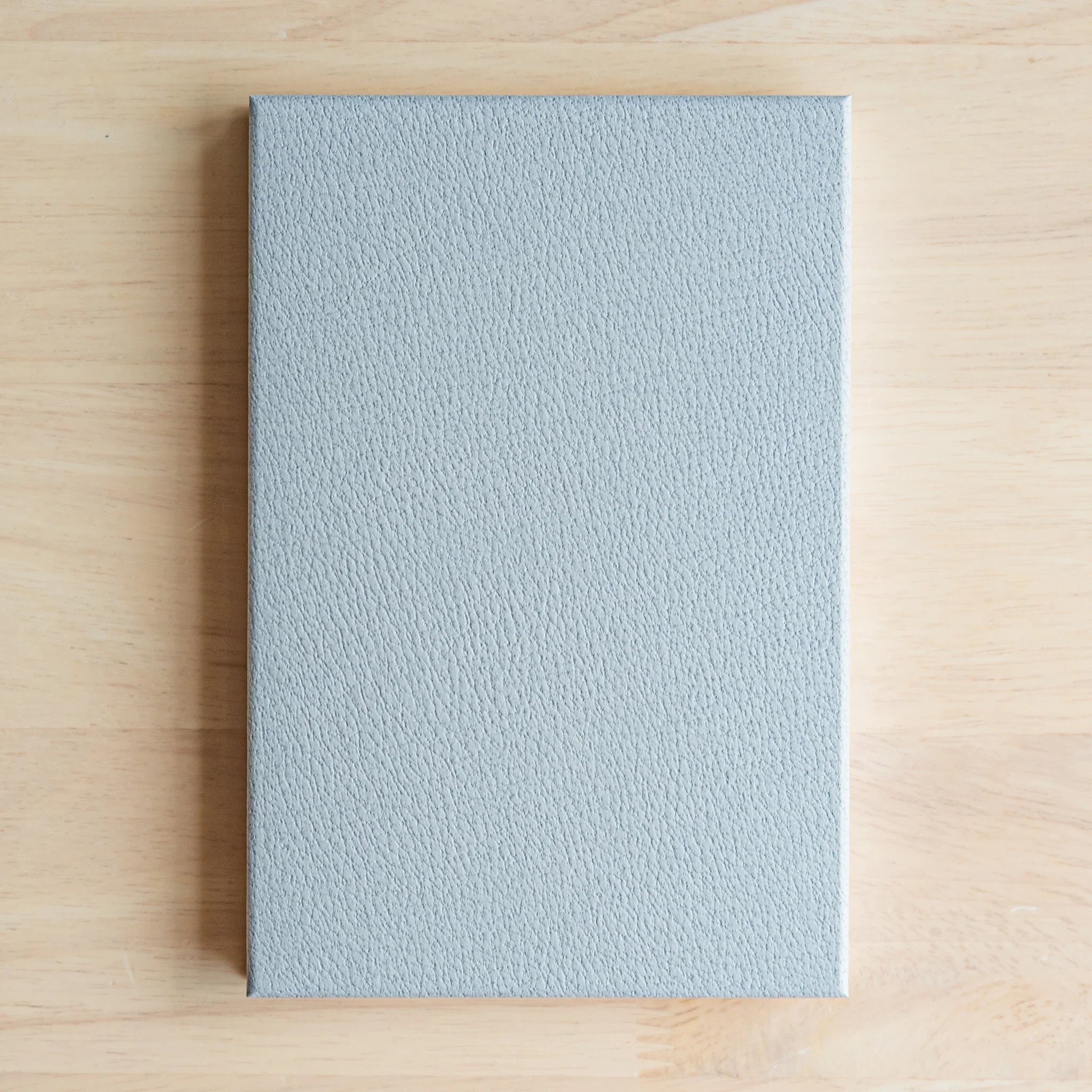 Interior pages of Chrysanthemum Harmony goshuincho fanned displaying paper thickness ready for temple stamp collection