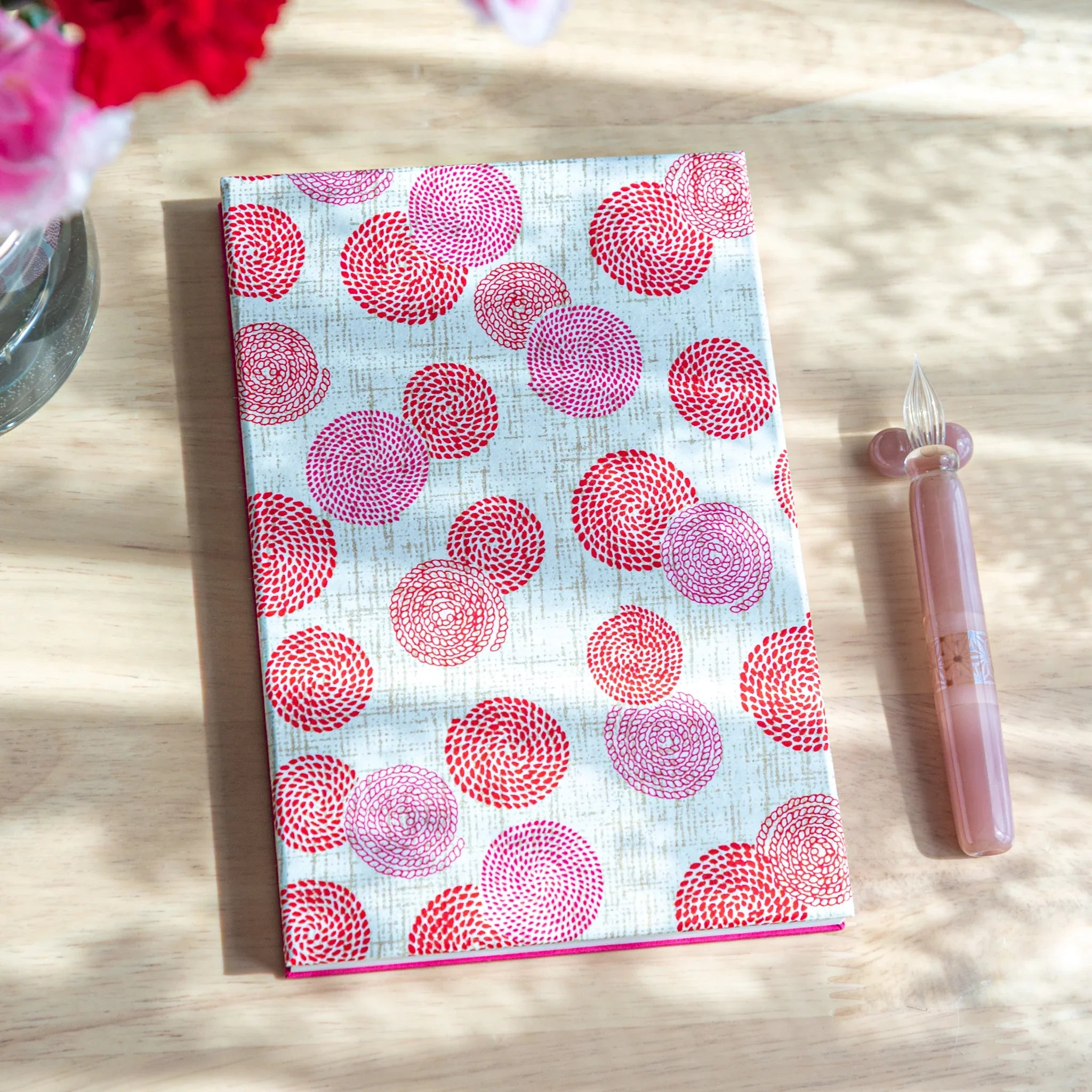 Circle of Blossoms washi goshuincho stamp book with white cover featuring circular floral pattern design