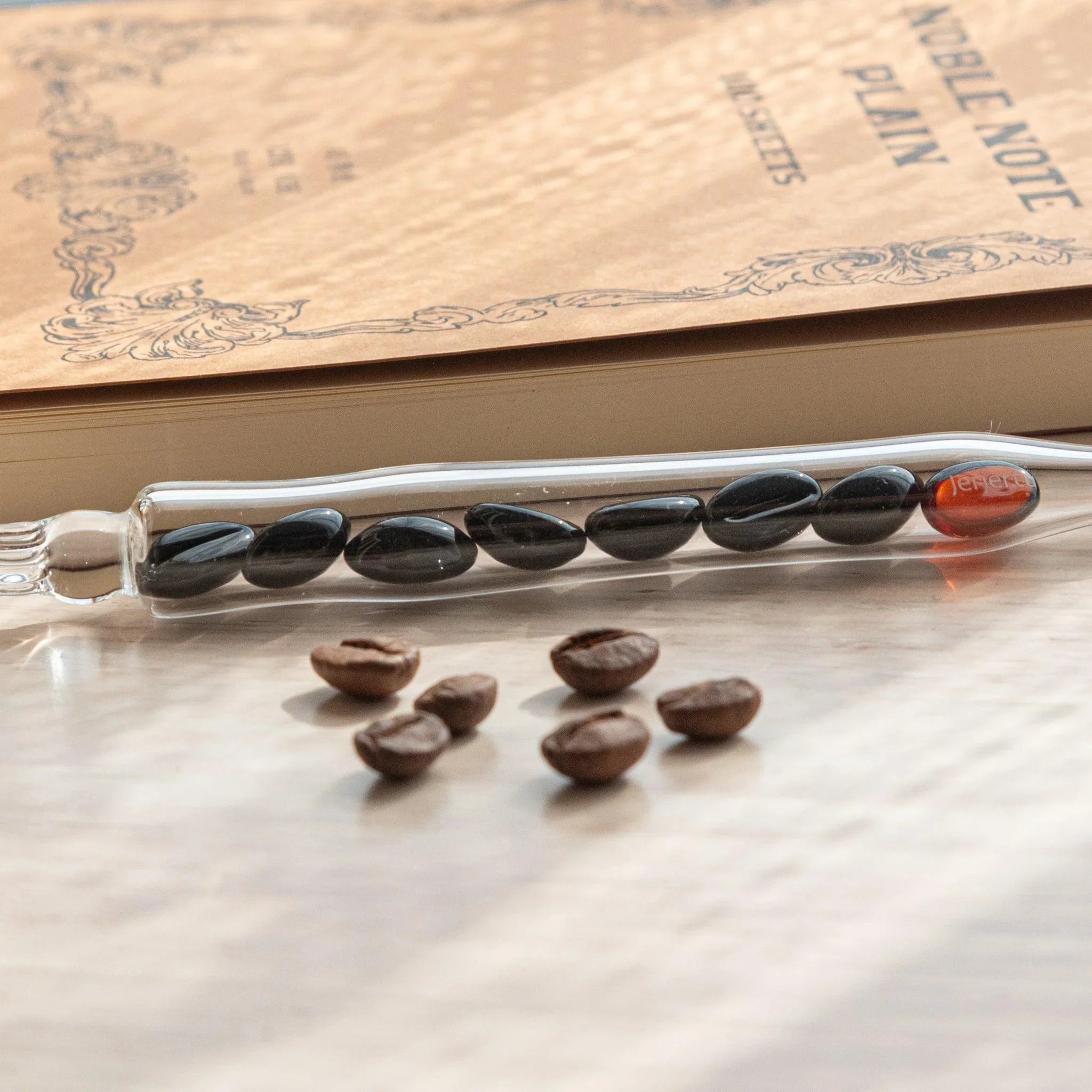 City Roast Coffee Beans Glass Dip Pen close-up showing glass band decorated with fine coffee bean illustration in brown