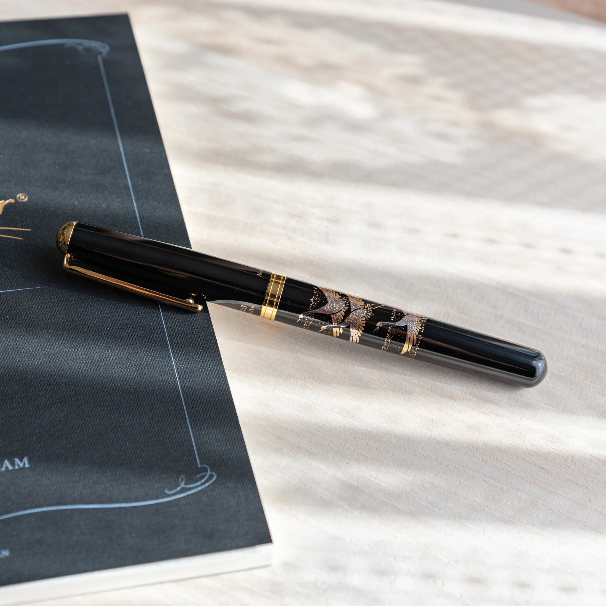 Crane Yamanaka fountain pen with lacquer design shown in composition in composition view product composition view