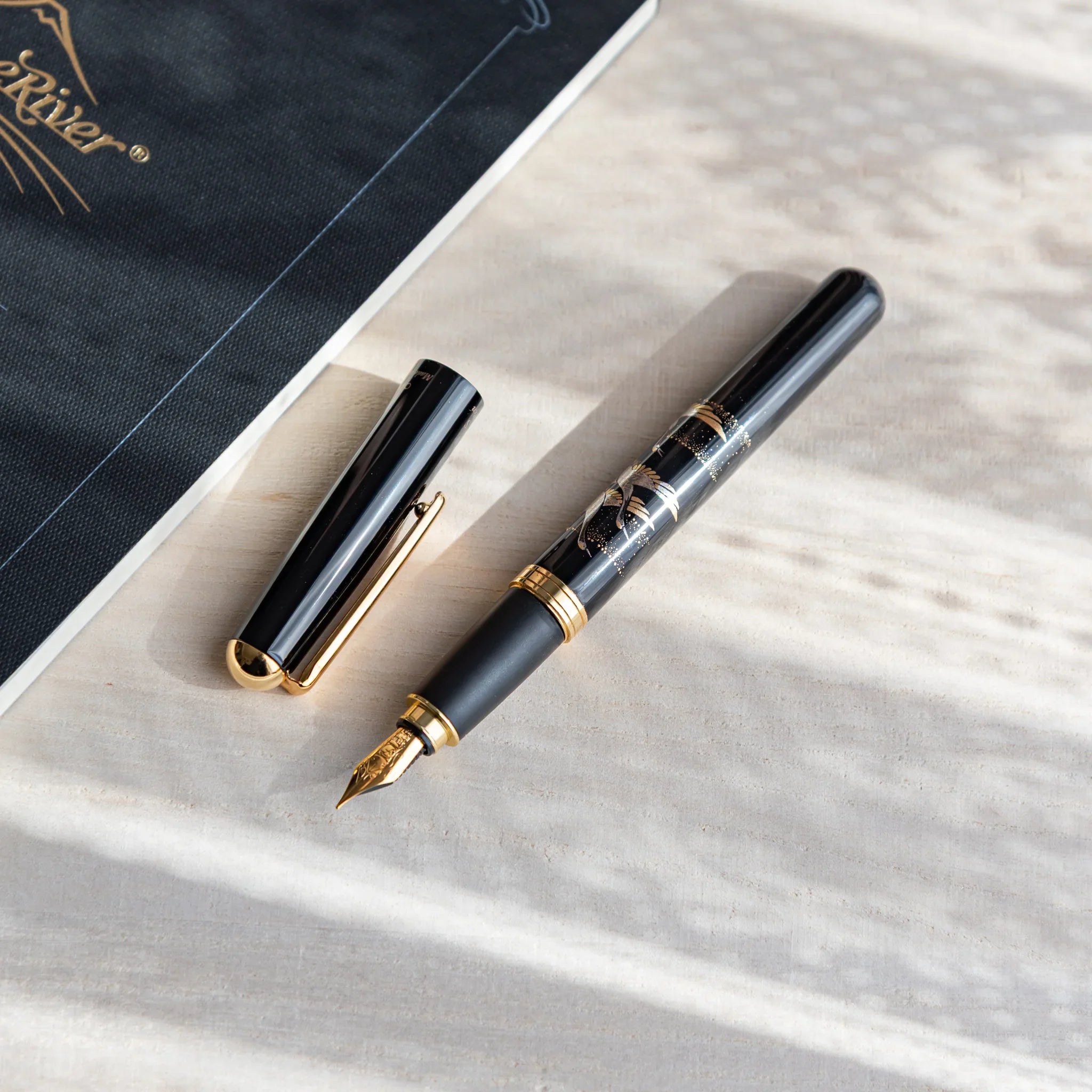 Crane Yamanaka fountain pen with lacquer design shown in composition displayed in detail product composition view