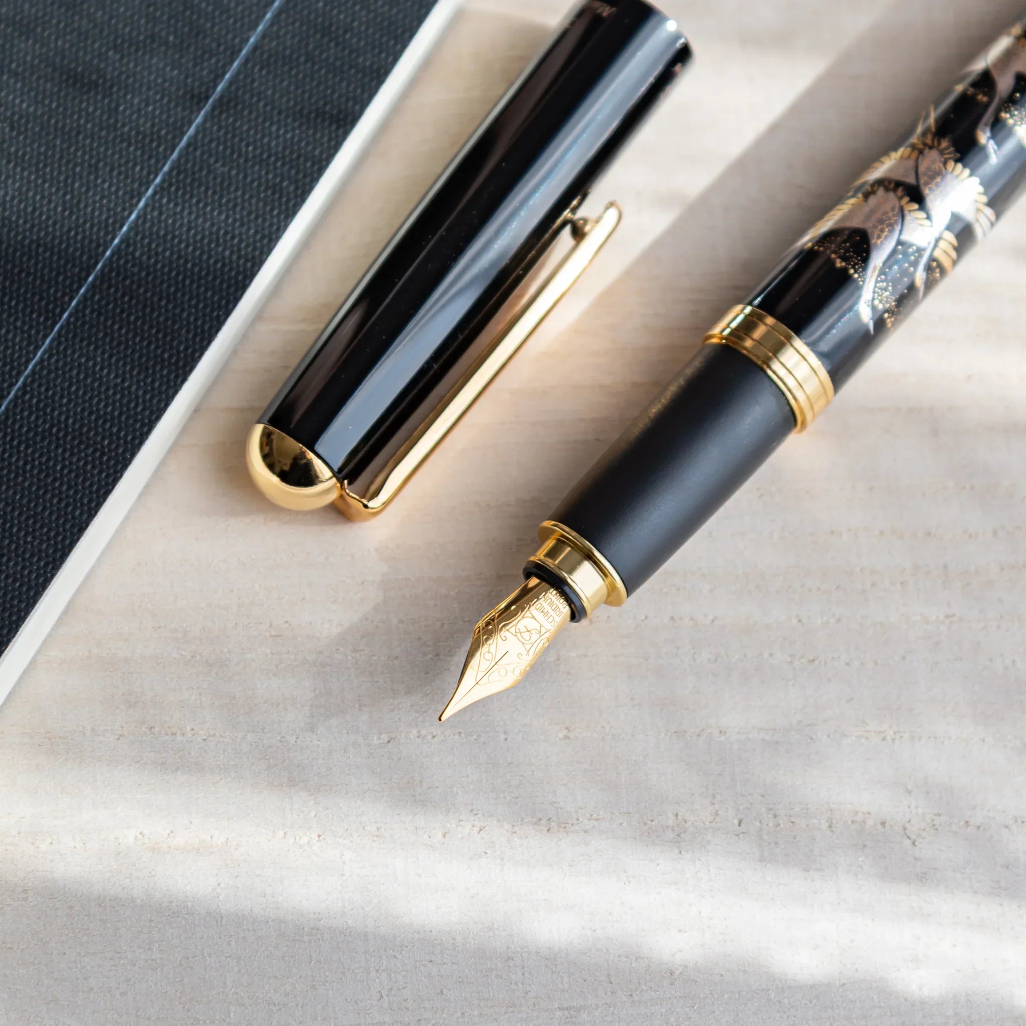 Crane Yamanaka fountain pen with lacquer design shown in composition shown composition product composition view