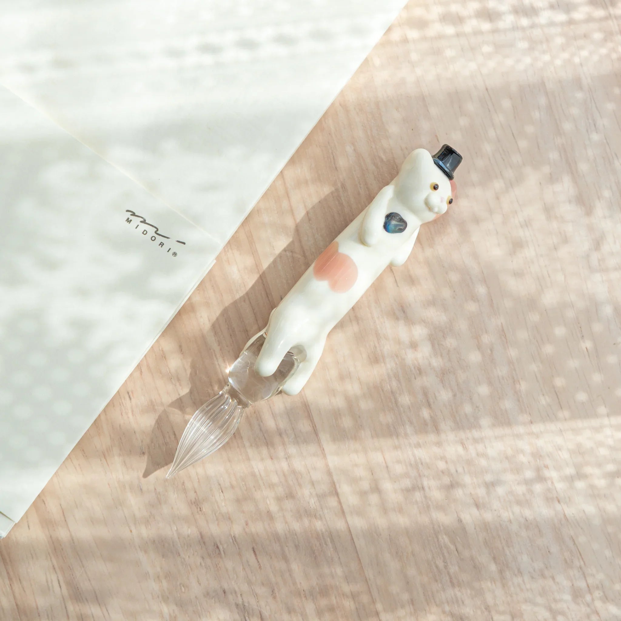 Cute spotted cat glass dip pen ideal for journal writing and artistic calligraphy with unique personality