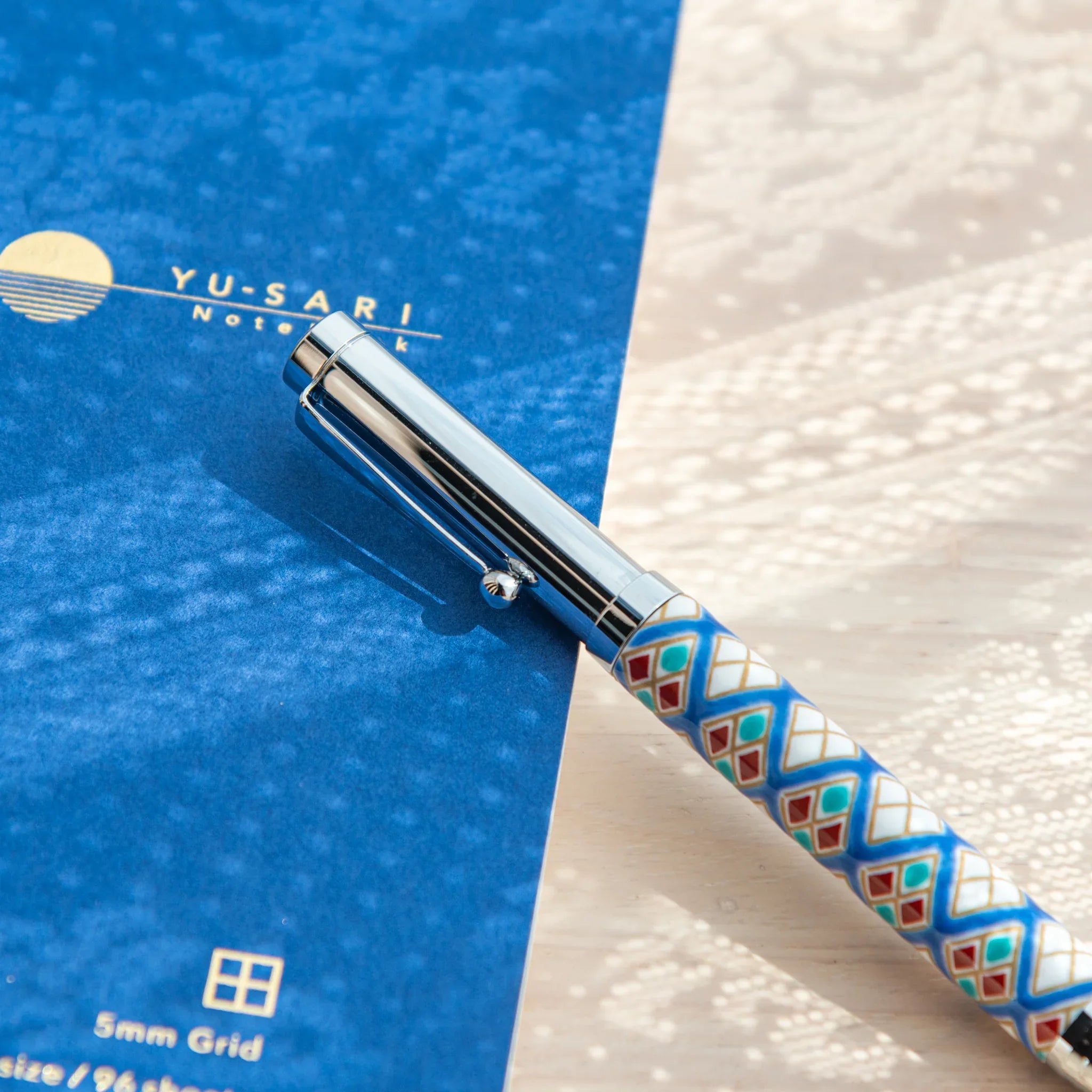 Hand-painted diamond geometric Kutani ballpoint pen combining traditional design modern for refined desk organization