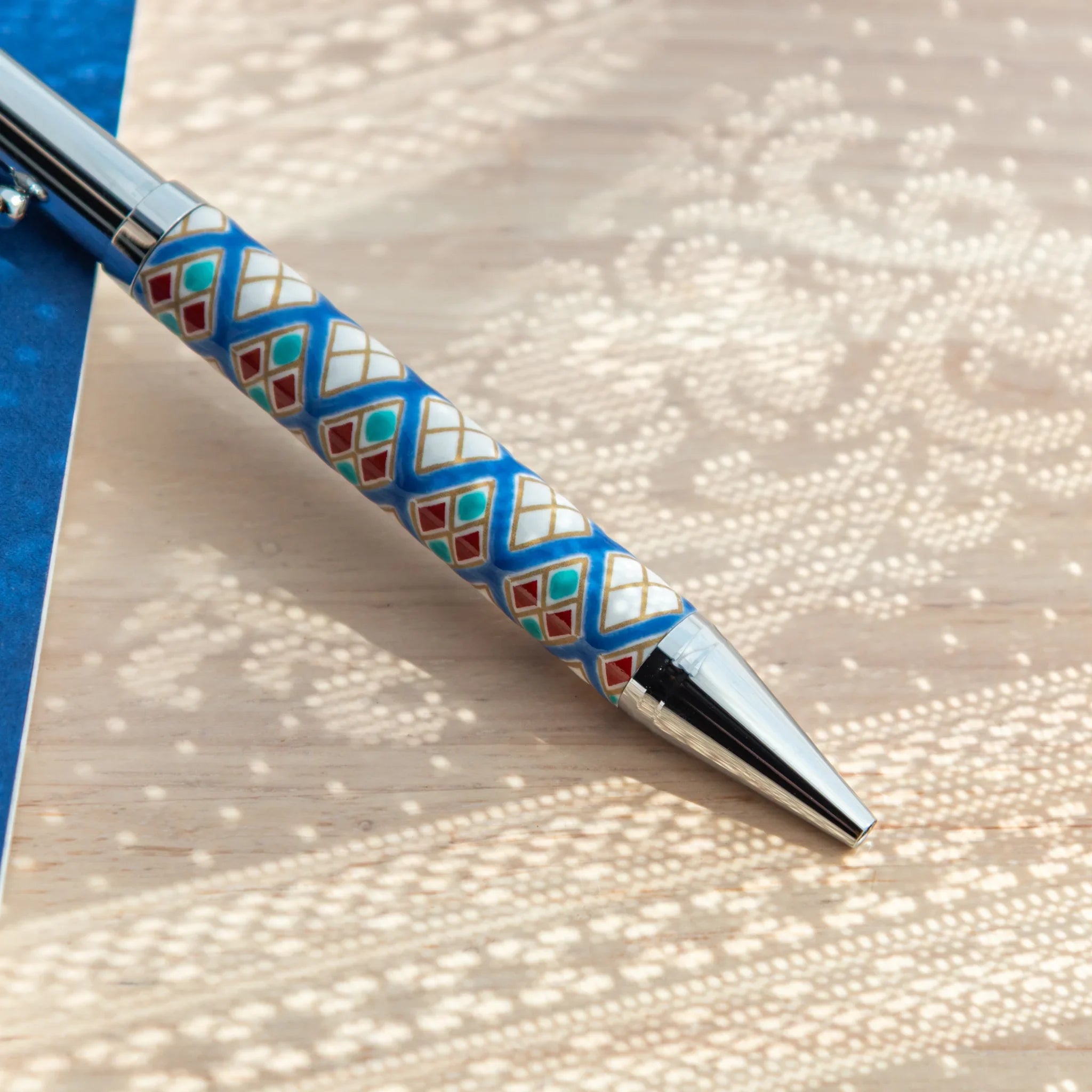 Decorative Kutani ceramic ballpoint pen with intricate diamond pattern for writing featuring traditional