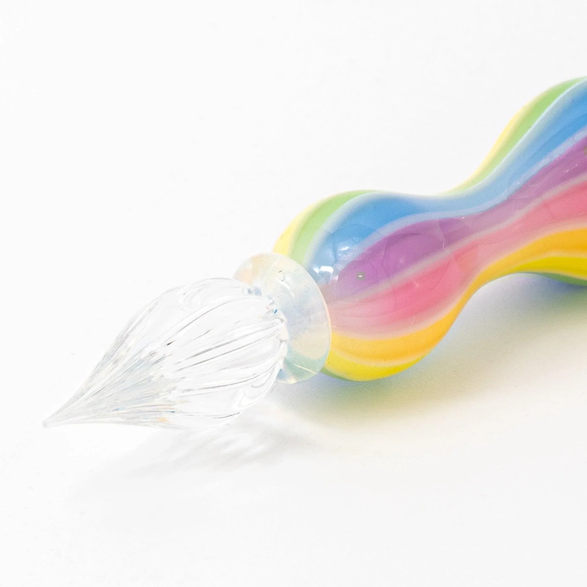 Light refraction through Marin glass balloon pen showing transparent color transitions and glass craftsmanship