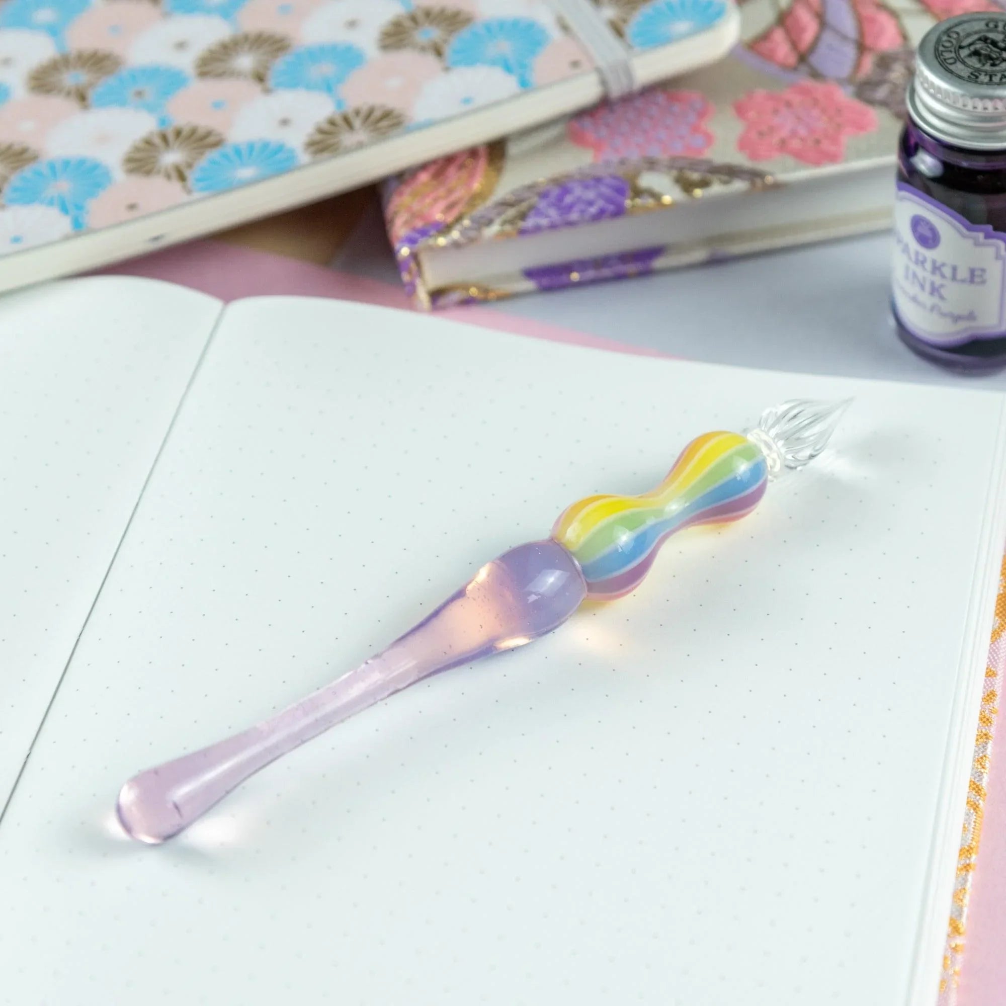 Dreamy Rainbow Rose glass balloon dip pen displayed standing showing full barrel and graceful shape showing translucent co