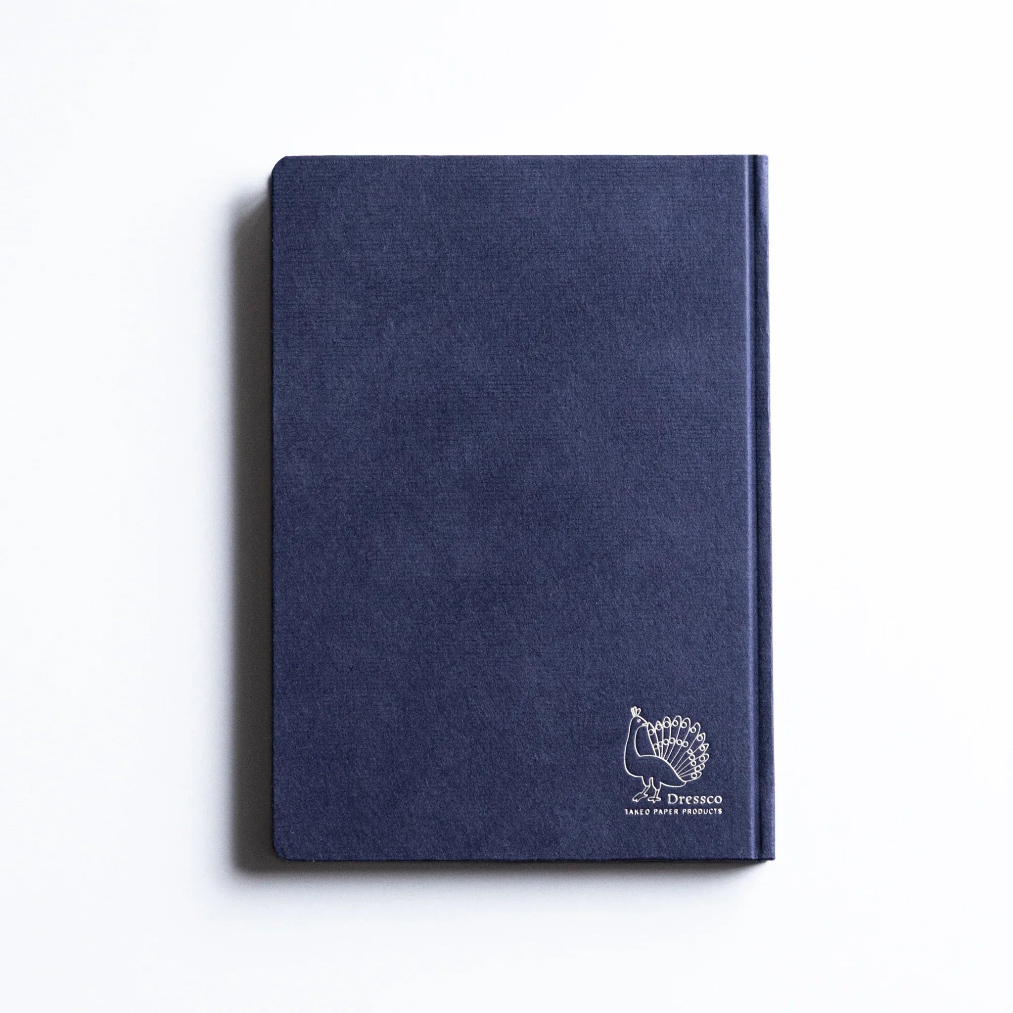 Back cover of Dressco Bank Ledger Paper Japanese Notebook in Navy with embossed logo.
