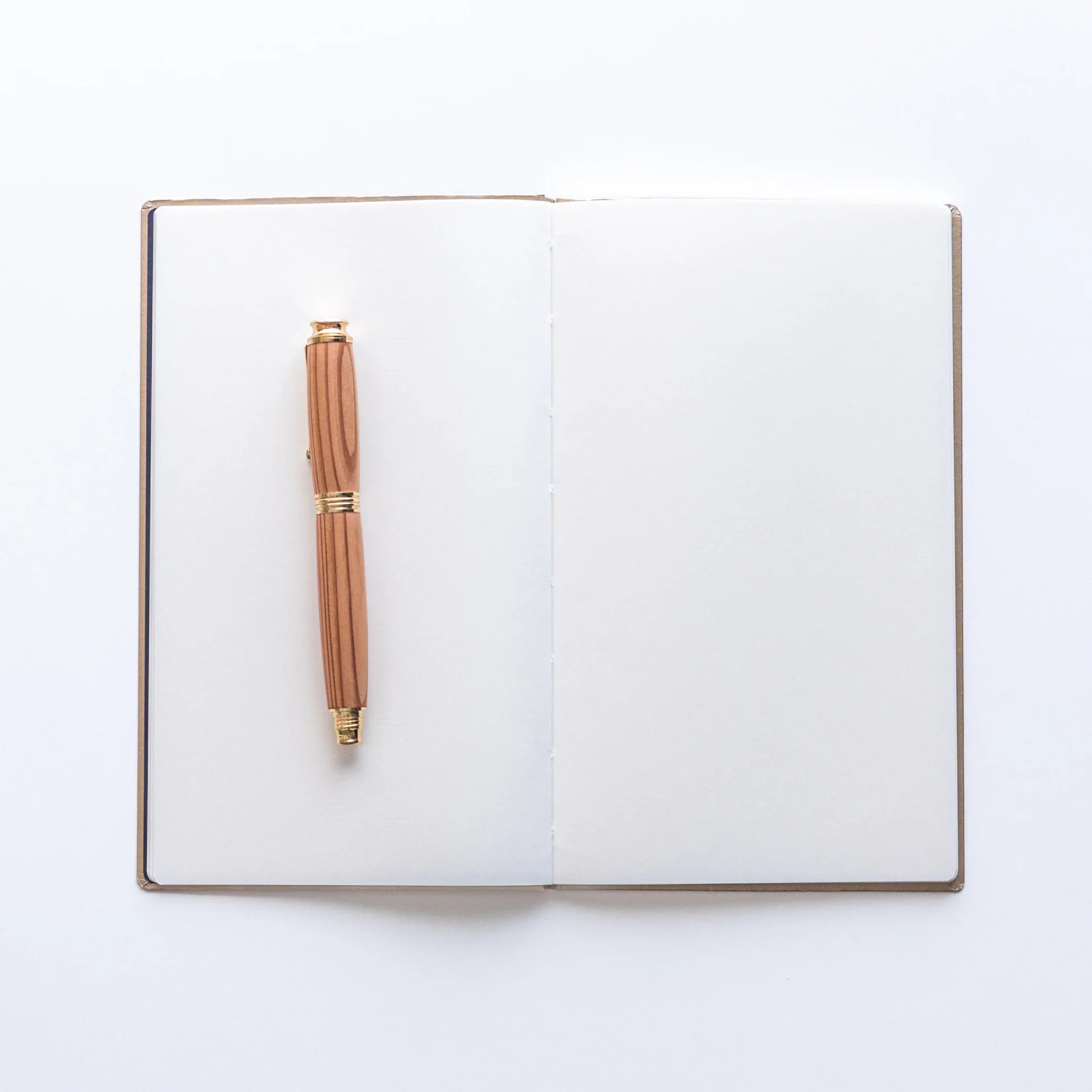 Dressco Bank Ledger Paper Japanese Notebook in Champagne Gold with refined texture and elegant finish.