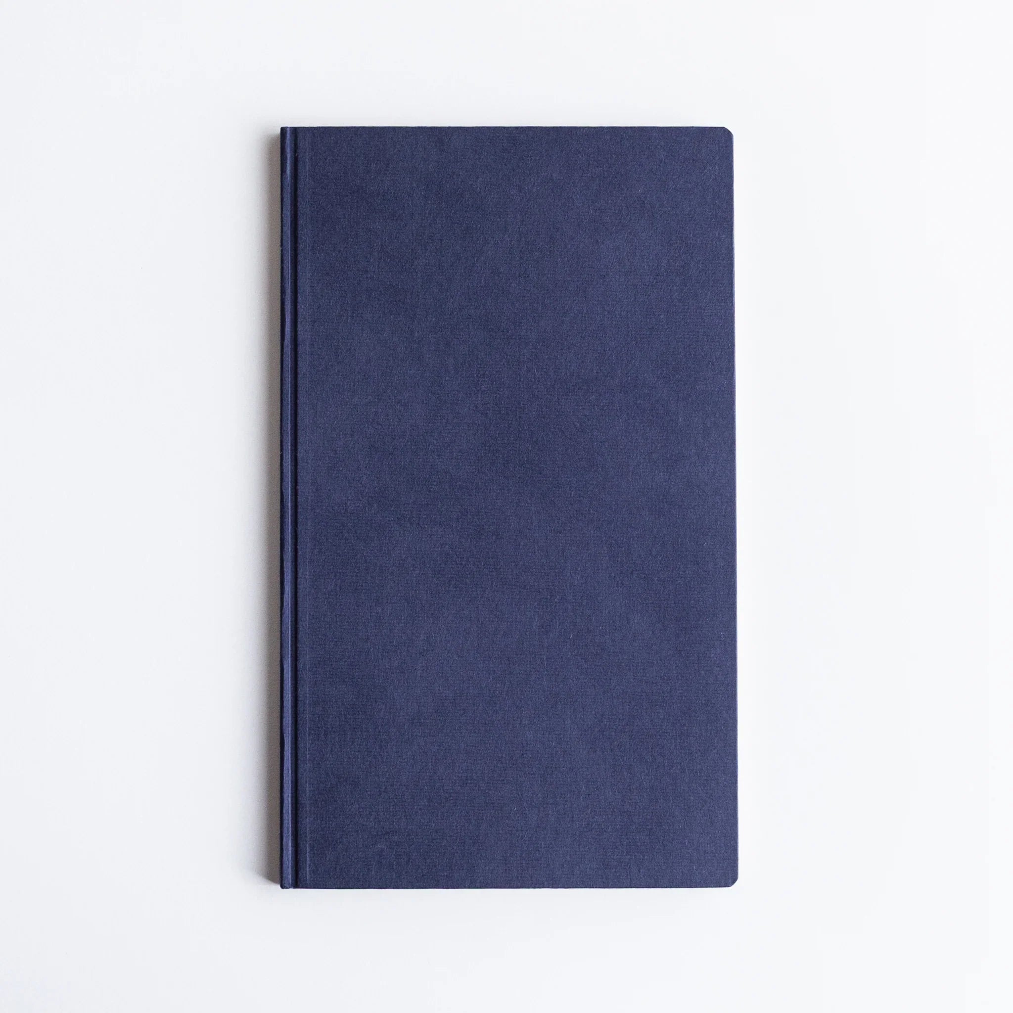 Dressco bank ledger paper A6 notebook, front cover view of closed notebook, Dressco Japanese horizontal-format bank ledger