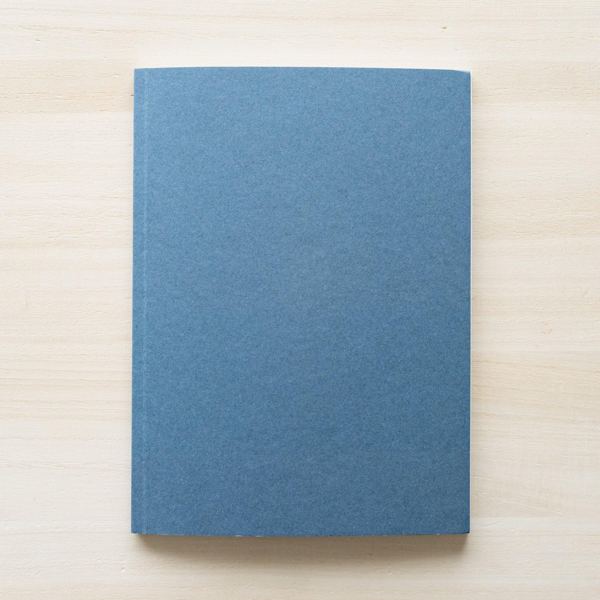 Gift presentation of Dressco indigo blue B6 onion skin notebook with packaging for writing and personal correspondence use