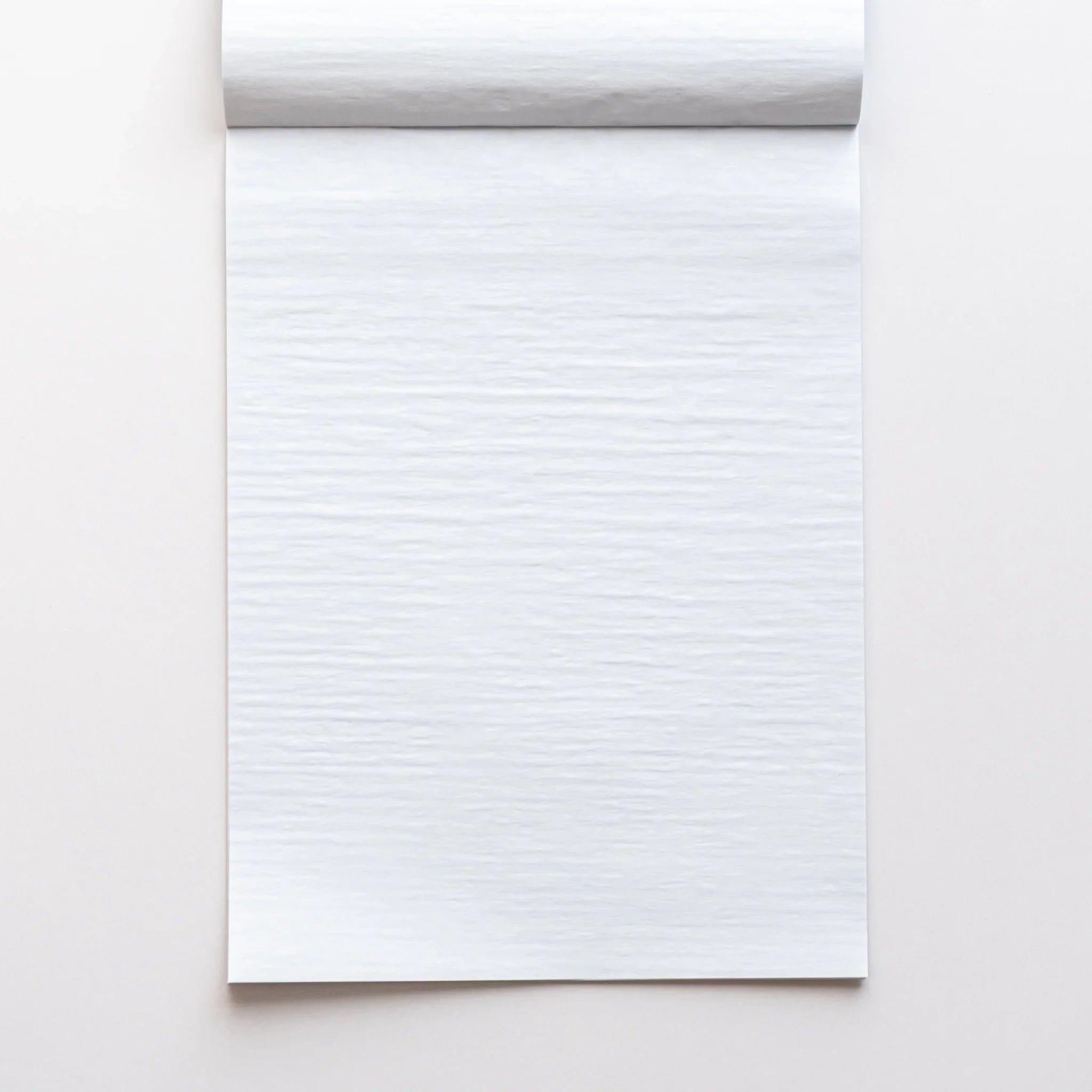 Dressco writing pad pages fanned showing quantity and thin paper transparency quality for writing and personal corresponde