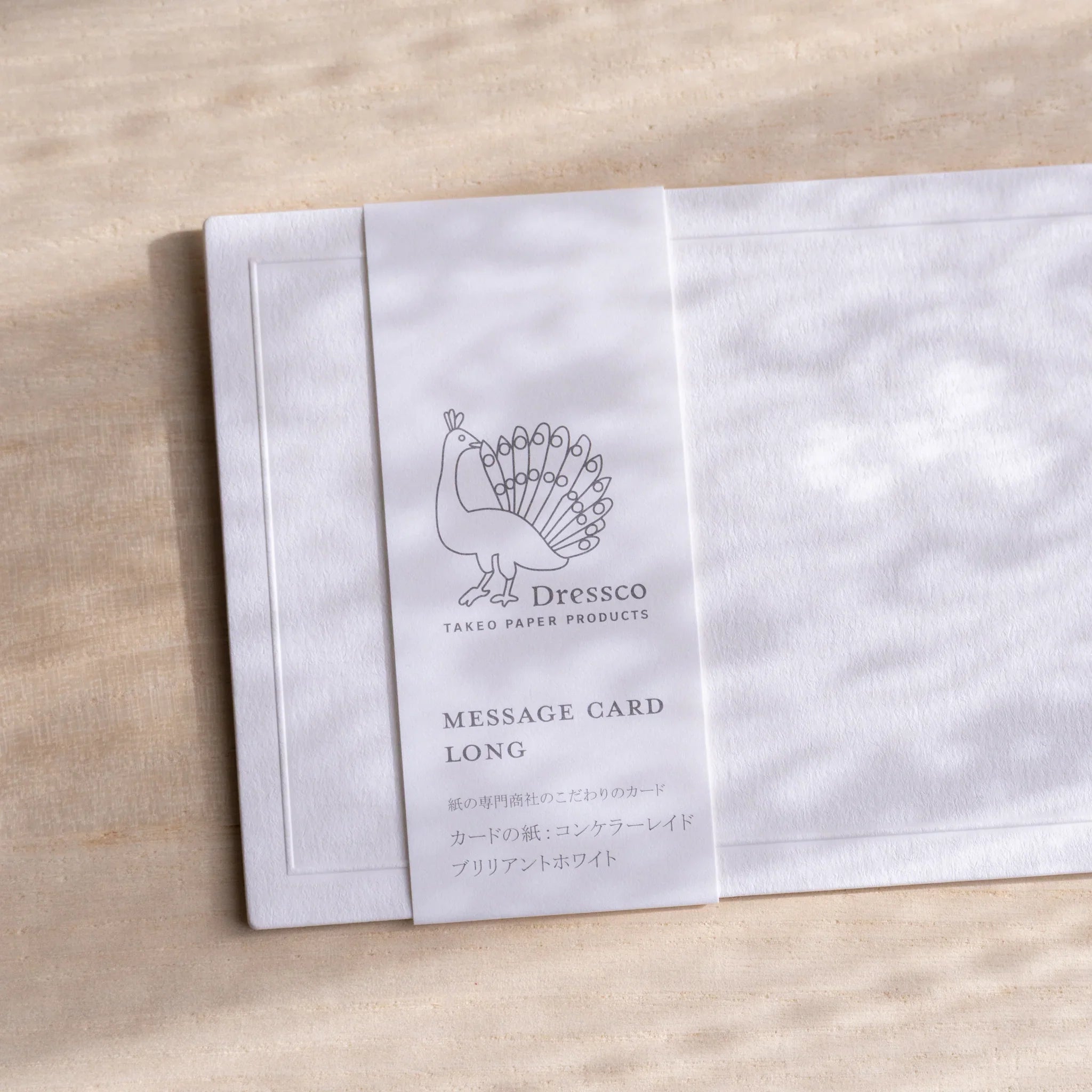 Back of Dressco Conqueror card showing blank writing surface and finish for writing and personal correspondence use