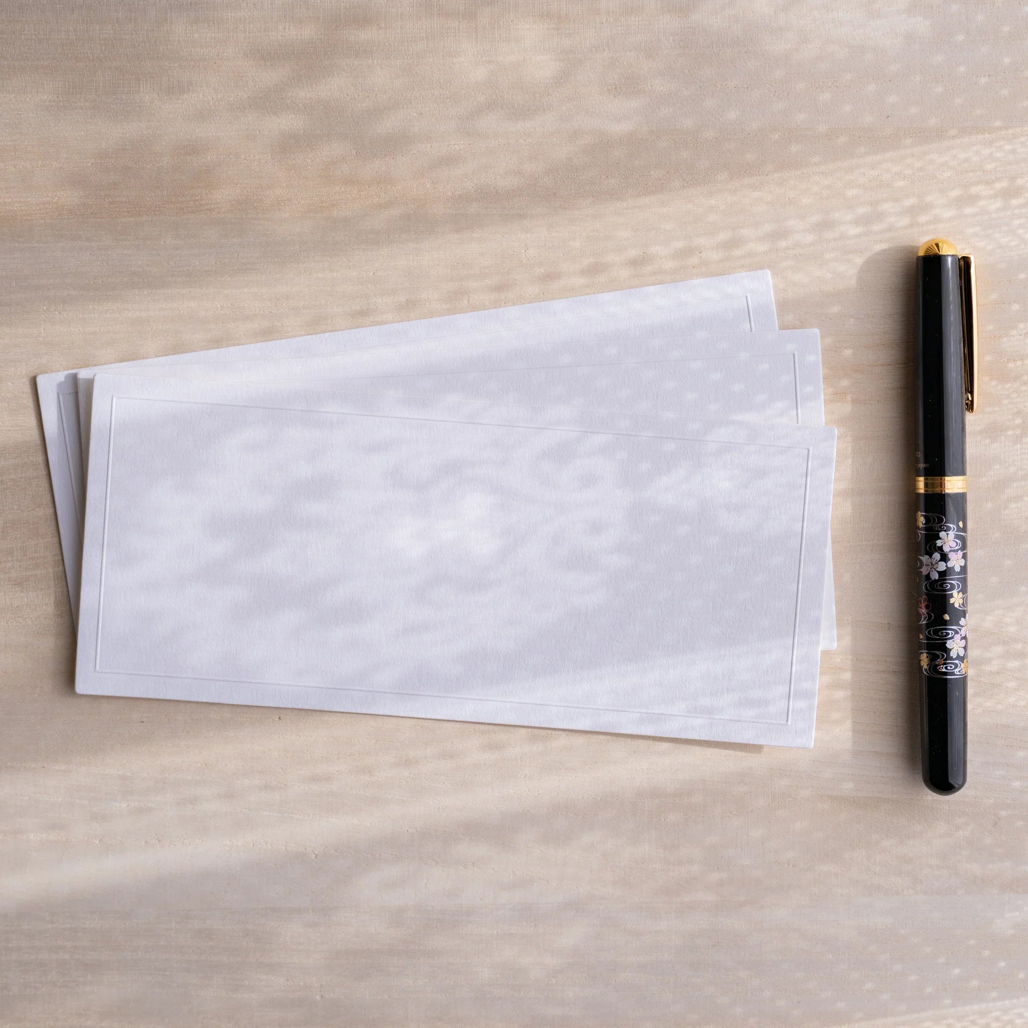 Gift packaging presentation of three-card Dressco Conqueror message card set for personal correspondence and gifting