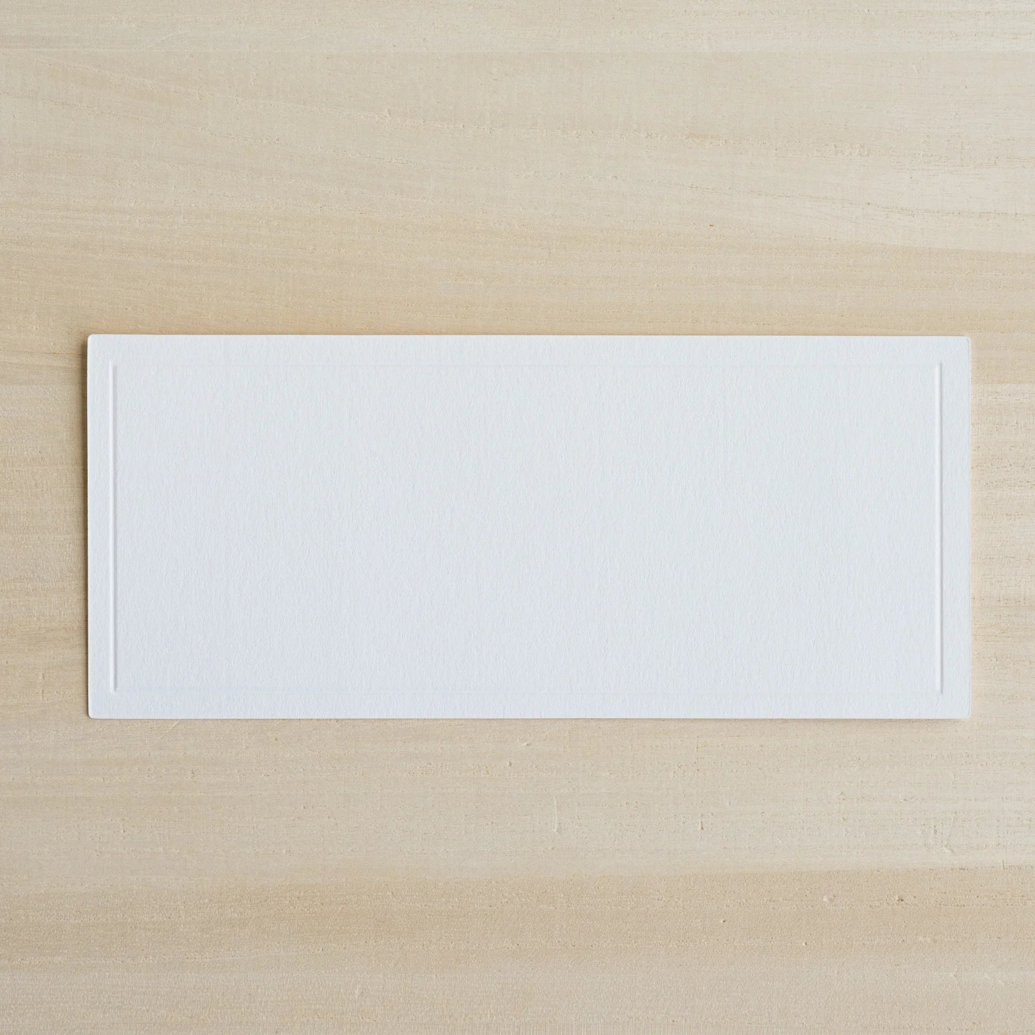 Set of three cards showing subtle color or shade variation in Conqueror paper showing product quality and design details