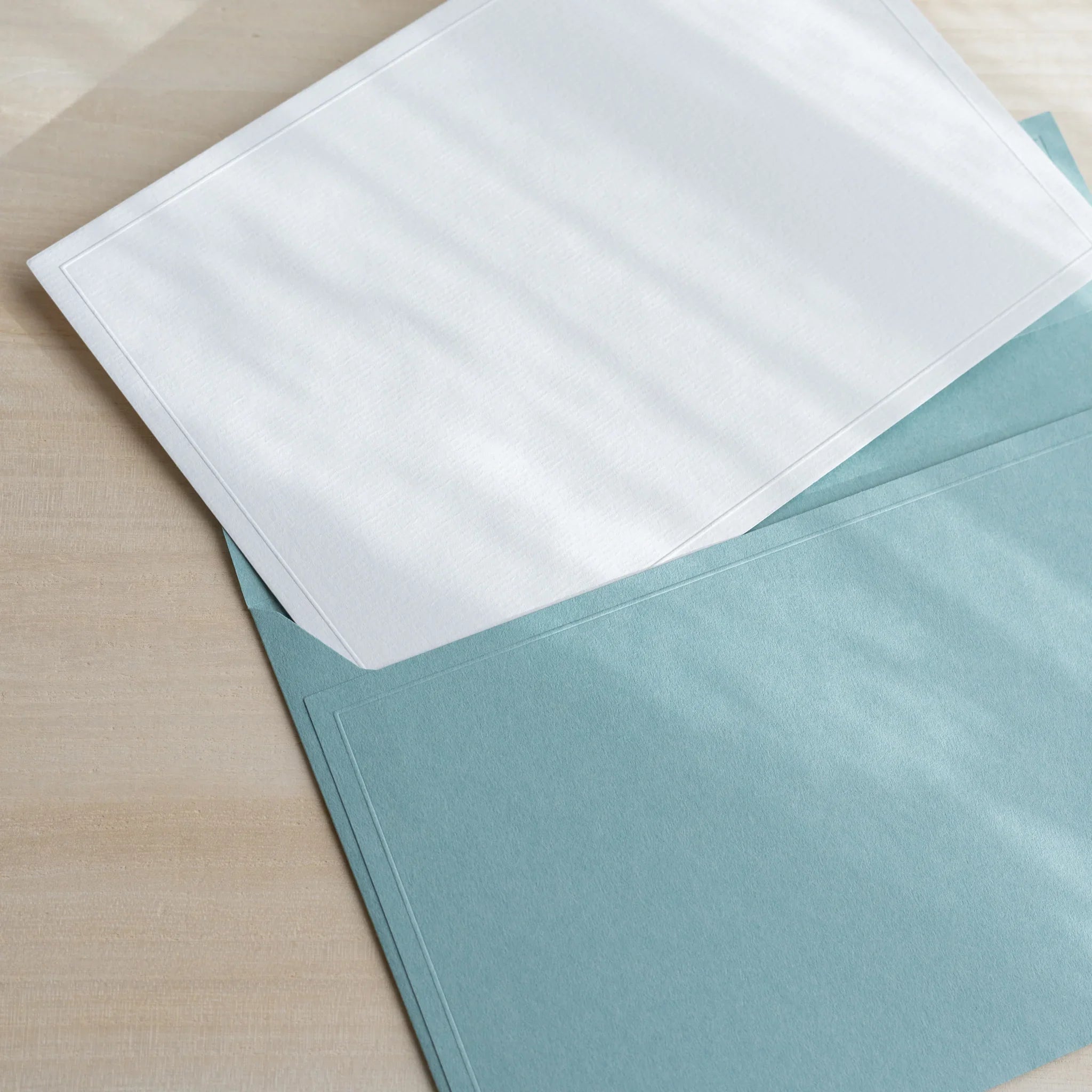 Dressco ivory large embossed envelope image ten, stacked arrangement view, with embossing elegance, set of three