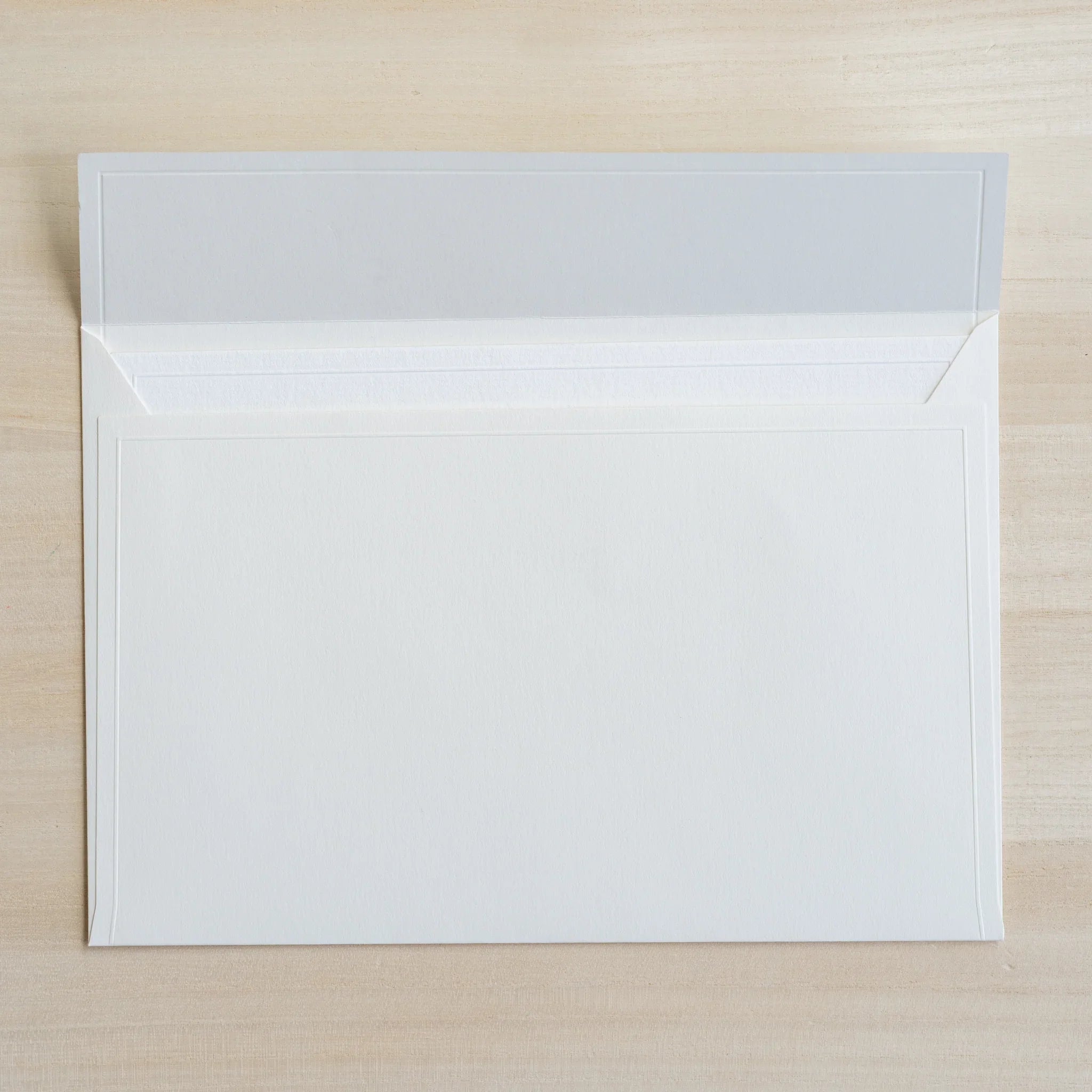 Dressco ivory large embossed envelope image twenty-four, right angled side view, with embossing detail, set of three