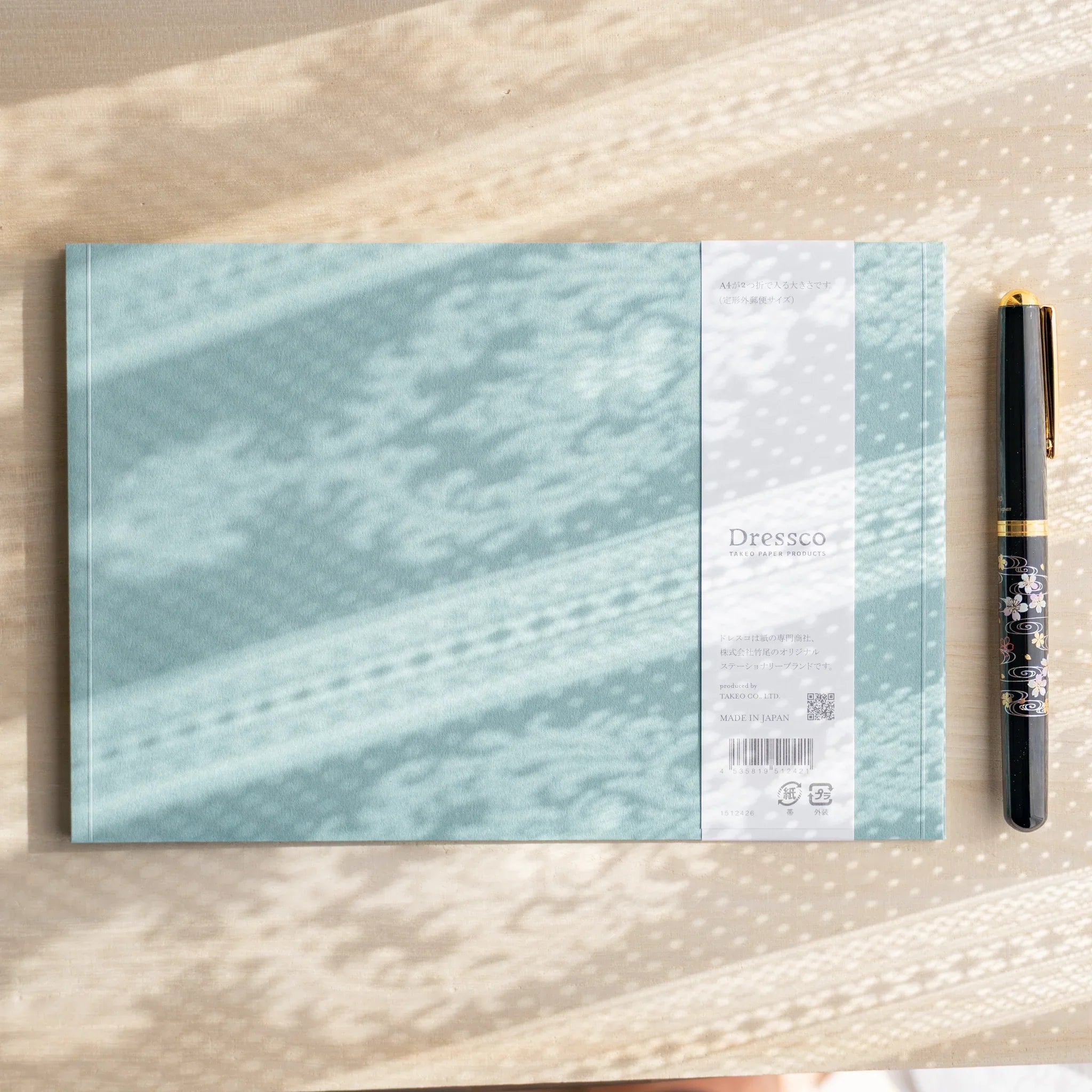 Dressco ivory large embossed envelope image three, left angled side view, with embossed finish, set of three quality